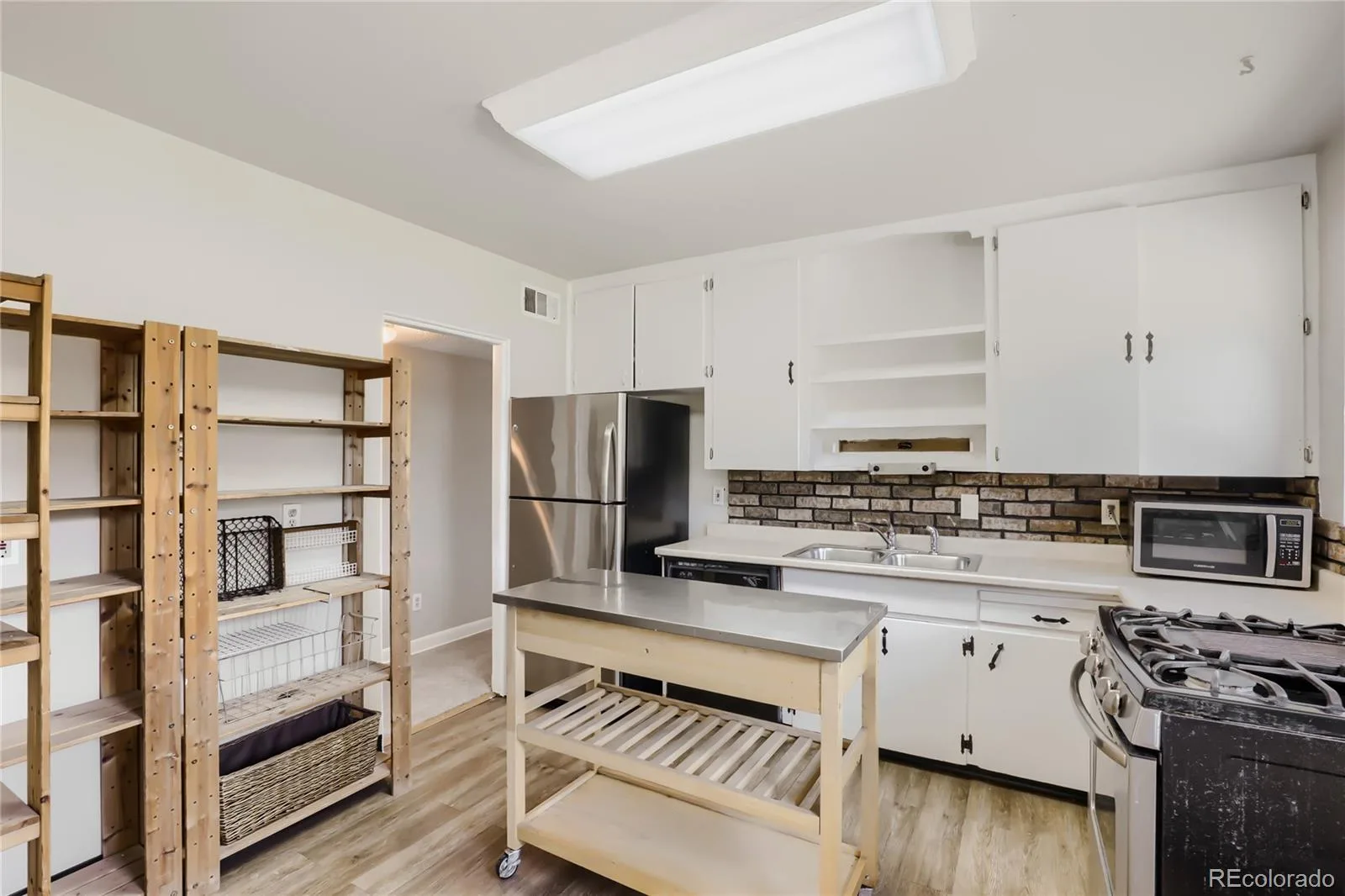1158 Revere Street Aurora CO 80011 | MLS #REC4099397 08292026001924 1600 10
