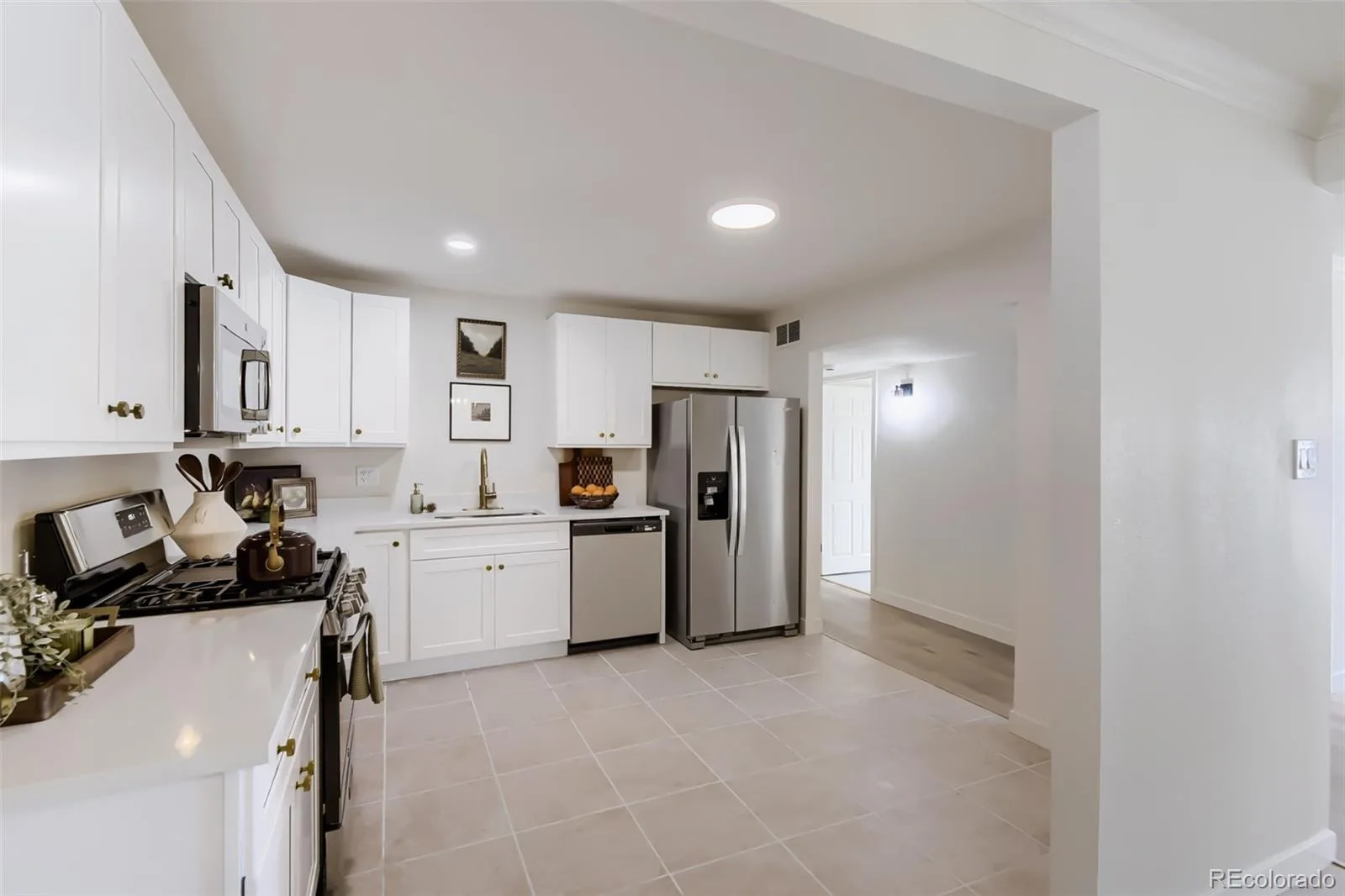 1174 Quentin Street Aurora CO 80011 | MLS #REC4169792 09242026000507 1600 8