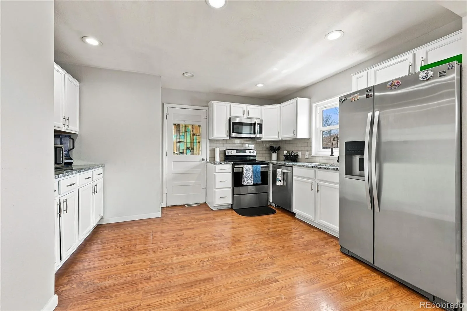 118 S Yates Way Denver CO 80219 | MLS #REC4181332 08142026185509 1600 5