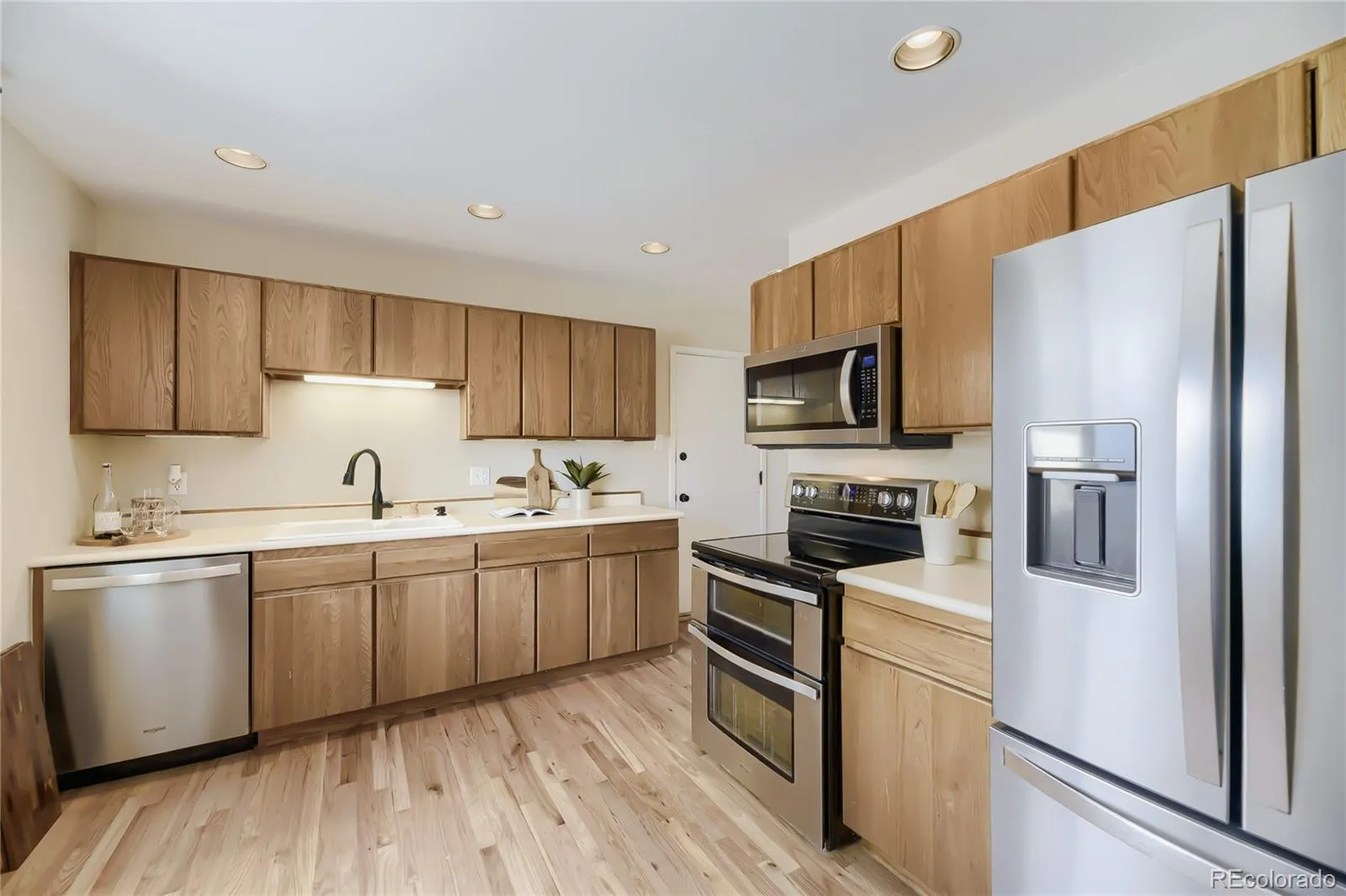 3265 S Newton Street Denver CO 80236 MLS #REC4195075 04232026235422 1600 8