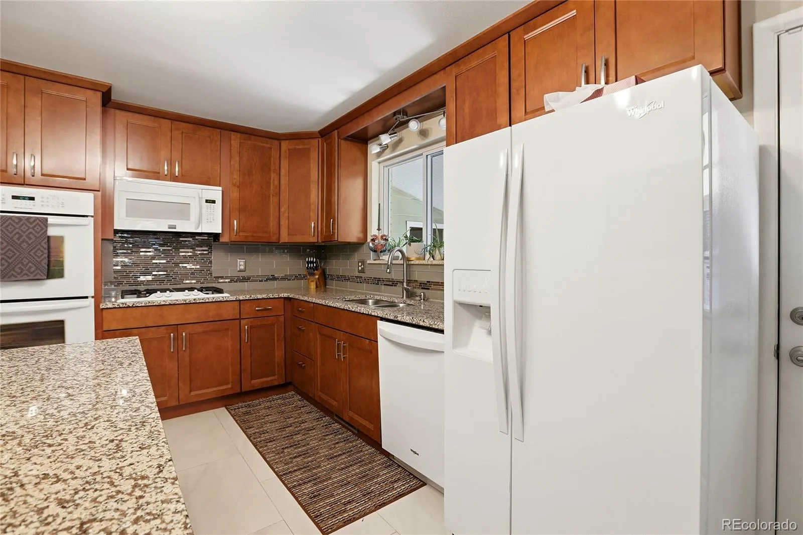 12946 E 2nd Avenue Aurora CO 80011 | MLS #REC4247255 08282026000528 1600 9