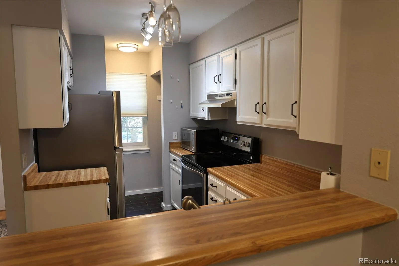 10879 W Dartmouth Avenue Lakewood CO 80227 | MLS #REC4404826 07222026134854 1600 10