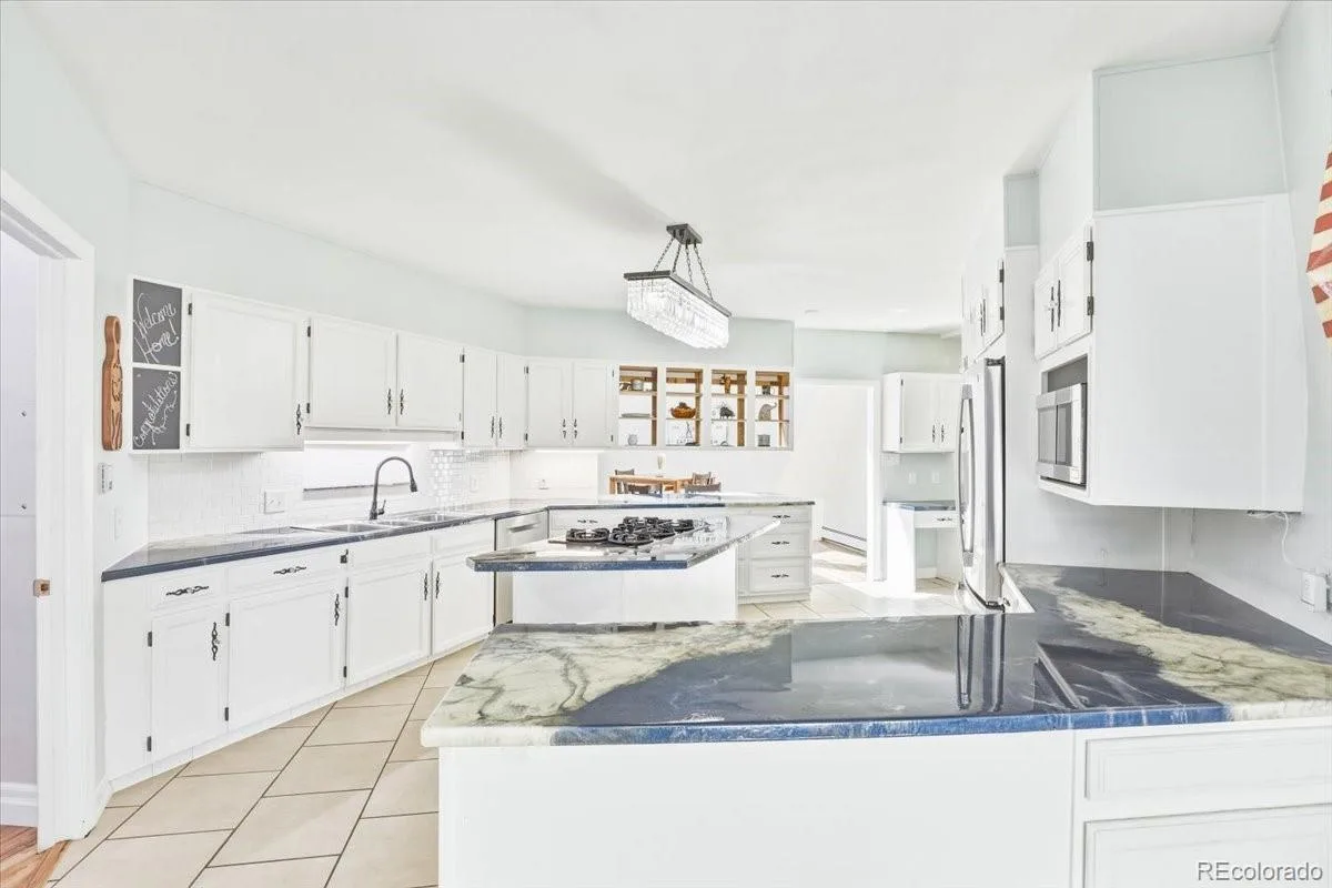7145 Rafter Road Franktown CO 80116 | MLS #REC4414141 08092026224426 1200 13