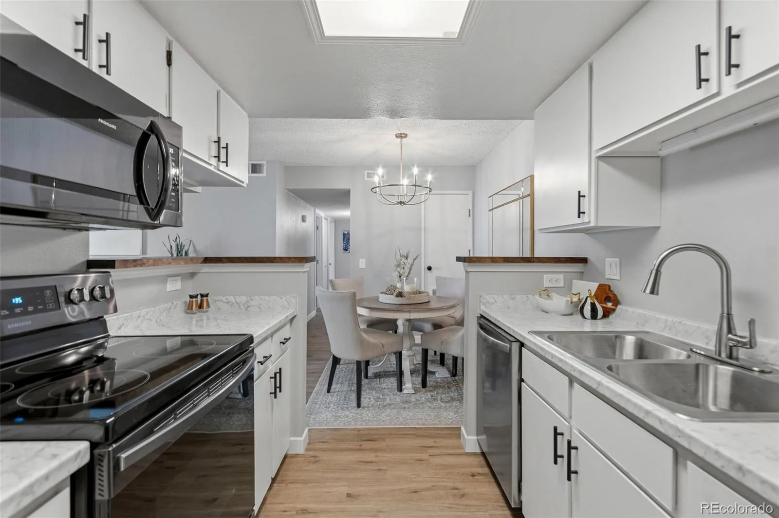 8555 Fairmount Drive #E102 Denver CO 80247 MLS #REC4444802 04242026055109 1600 1