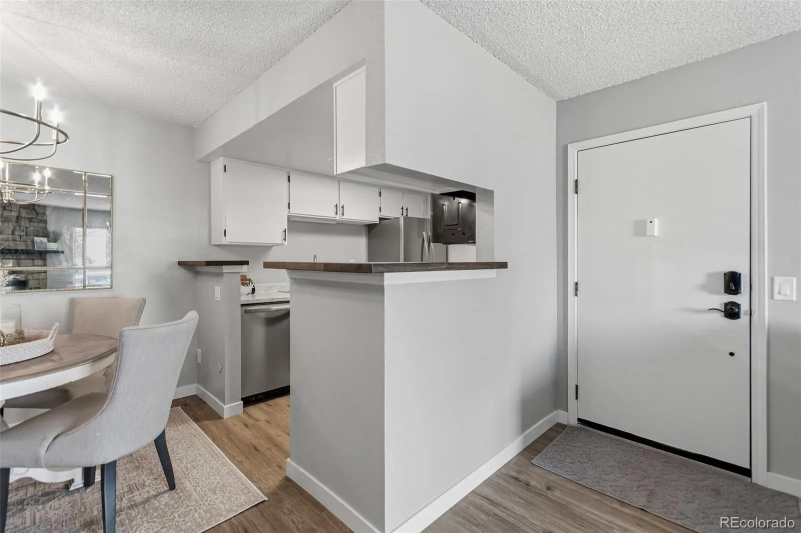 8555 Fairmount Drive #E102 Denver CO 80247 MLS #REC4444802 04242026055109 1600 10