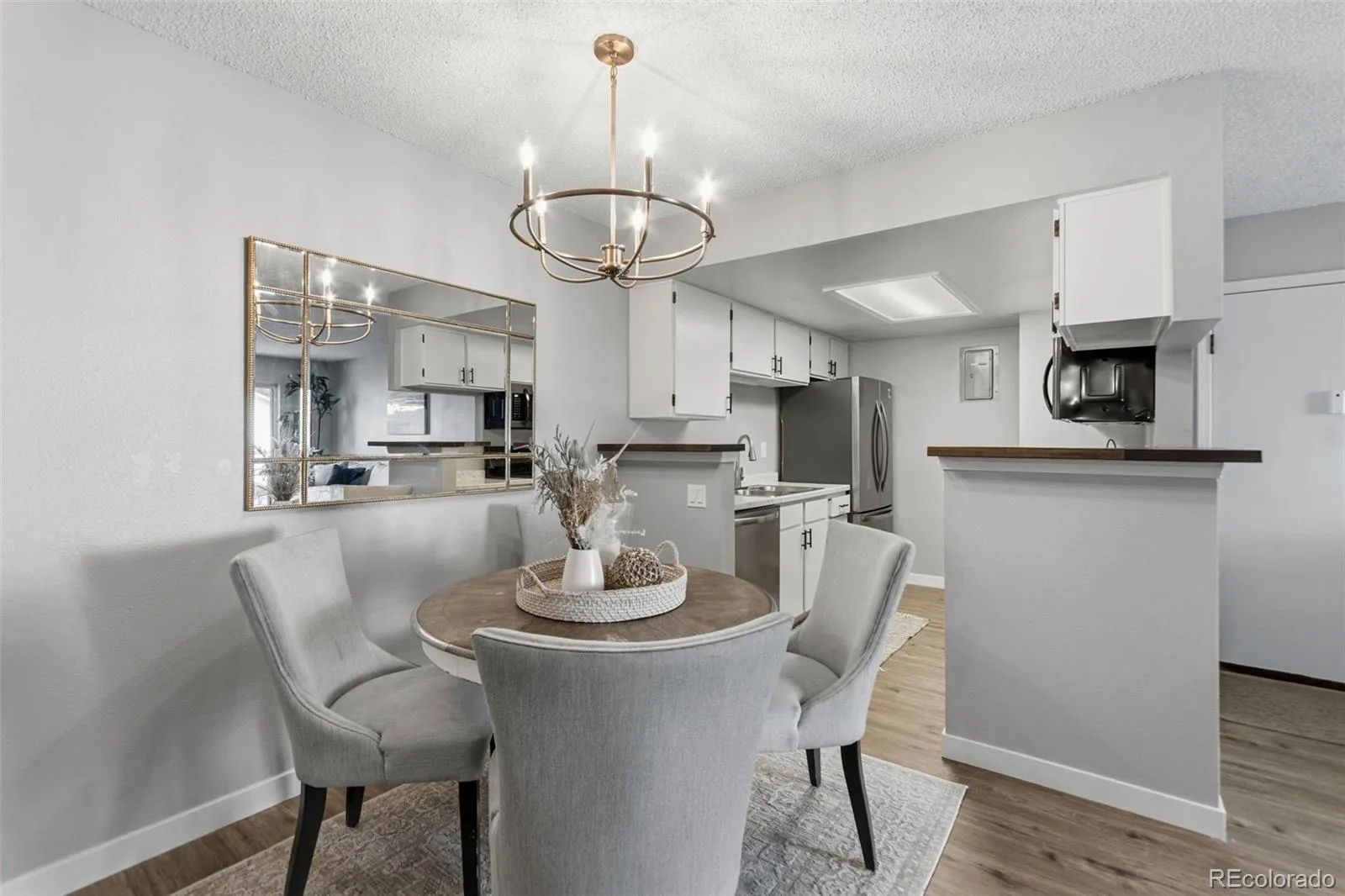 8555 Fairmount Drive #E102 Denver CO 80247 MLS #REC4444802 04242026055109 1600 12