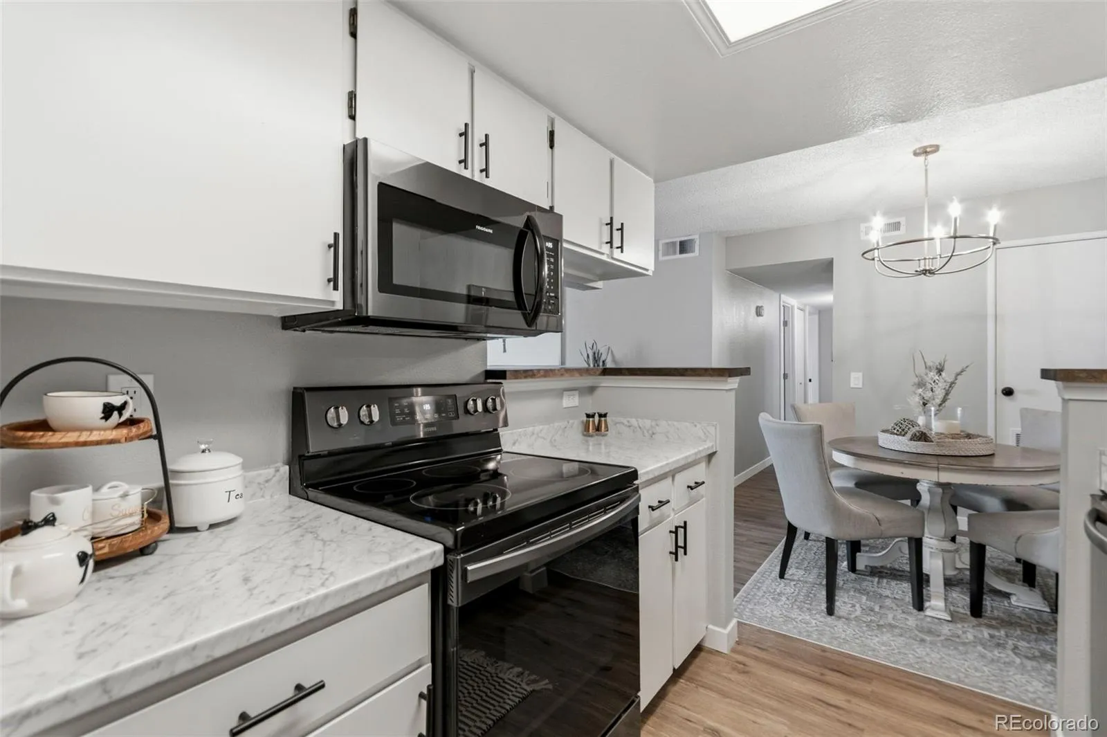 8555 Fairmount Drive #E102 Denver CO 80247 MLS #REC4444802 04242026055109 1600 16