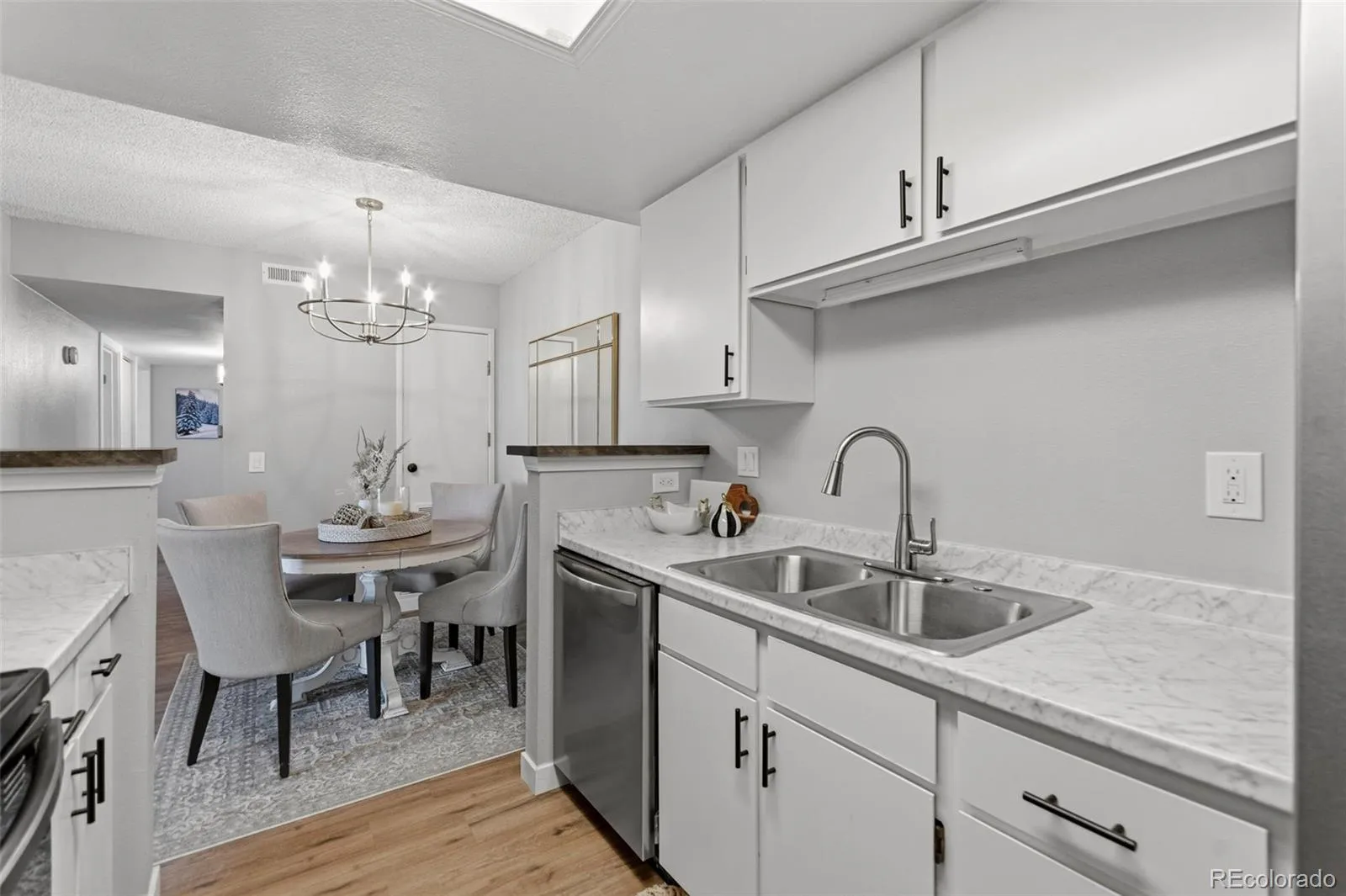 8555 Fairmount Drive #E102 Denver CO 80247 MLS #REC4444802 04242026055109 1600 17