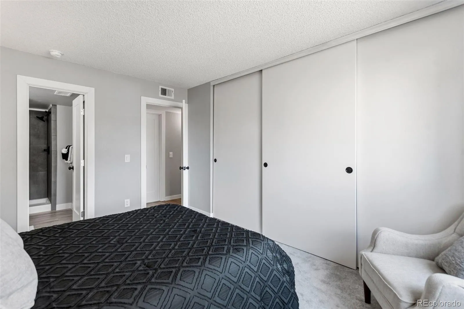 8555 Fairmount Drive #E102 Denver CO 80247 MLS #REC4444802 04242026055109 1600 18