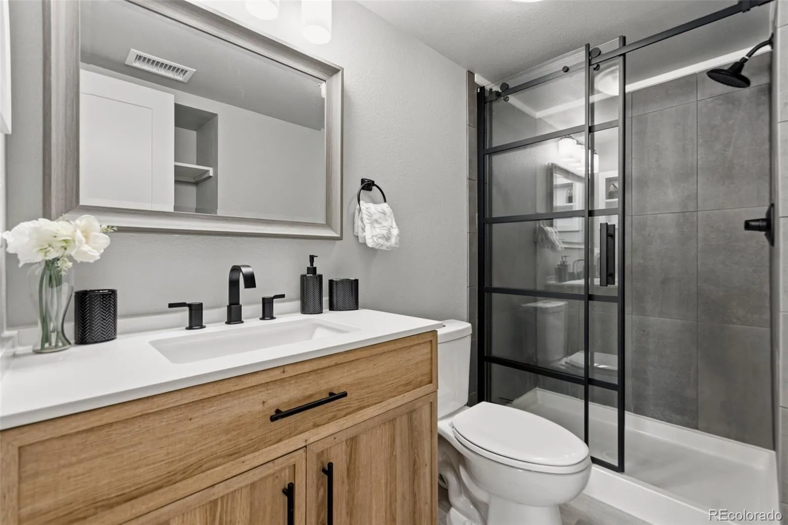 8555 Fairmount Drive #E102 Denver CO 80247 MLS #REC4444802 04242026055109 1600 2