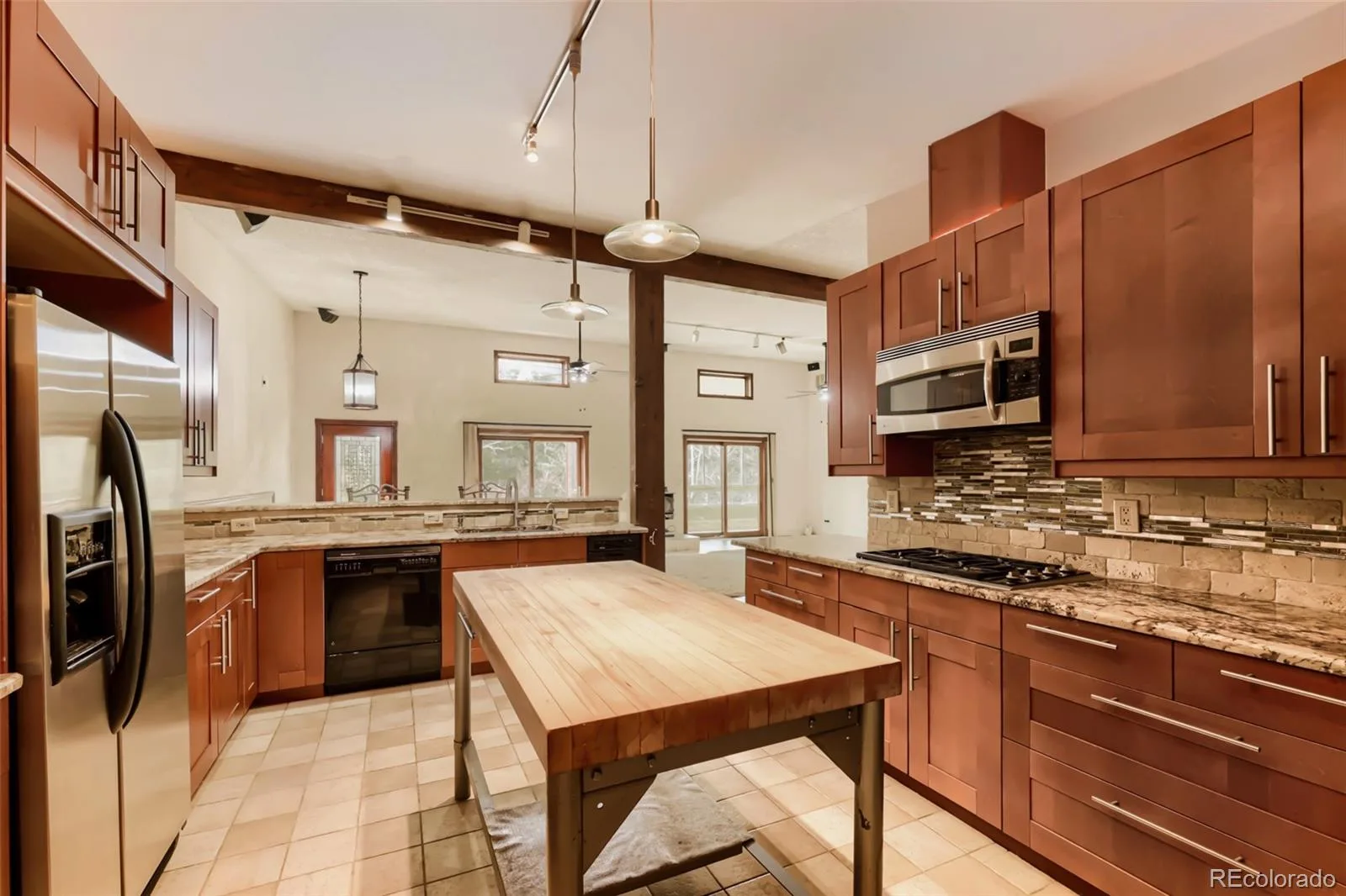 720 N Bluff Drive Franktown CO 80116 | MLS #REC4462747 06092026001208 1600 8
