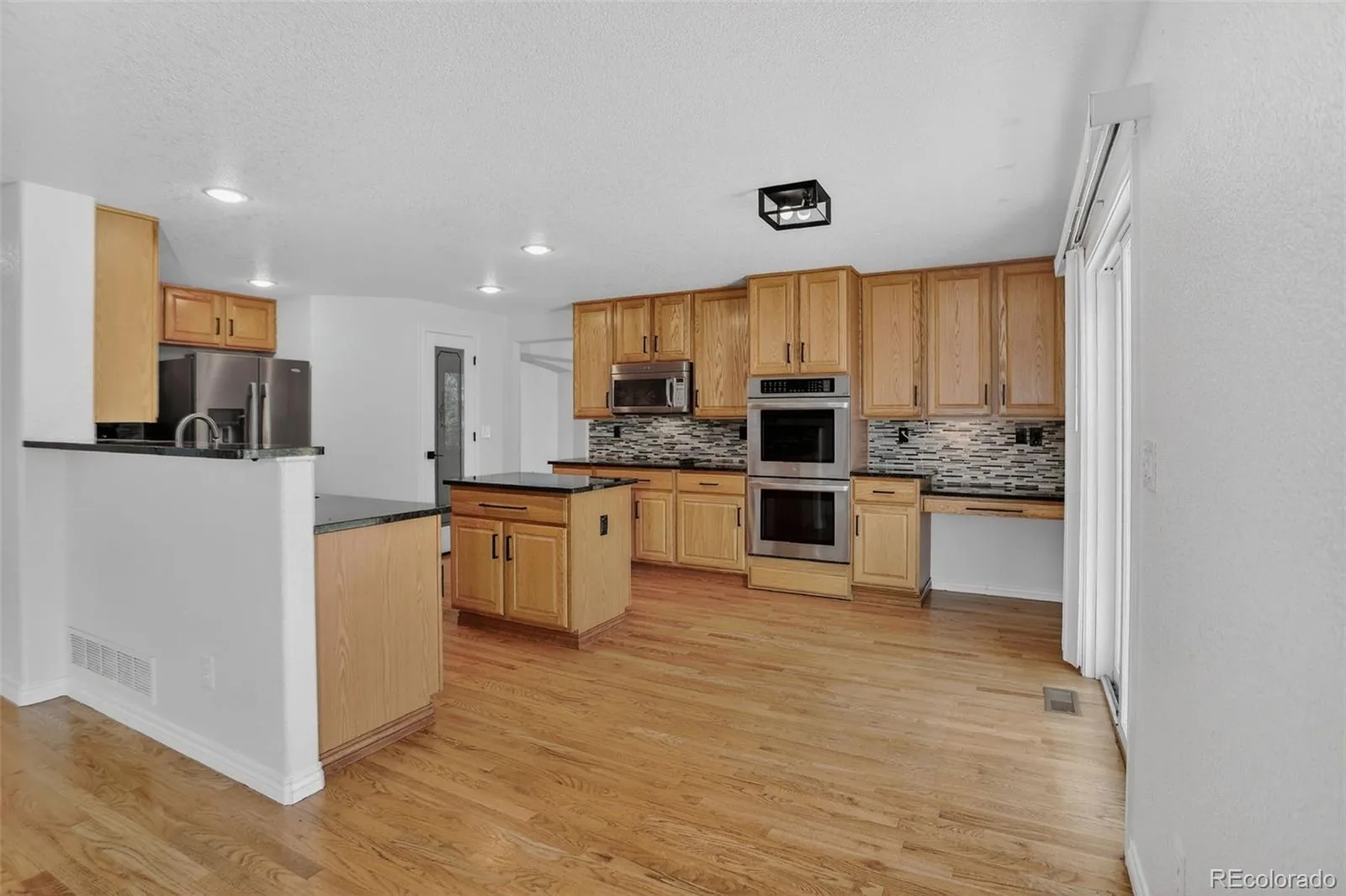 14942 Vine Street Thornton CO 80602 | MLS #REC4476974 07032026133306 1600 1