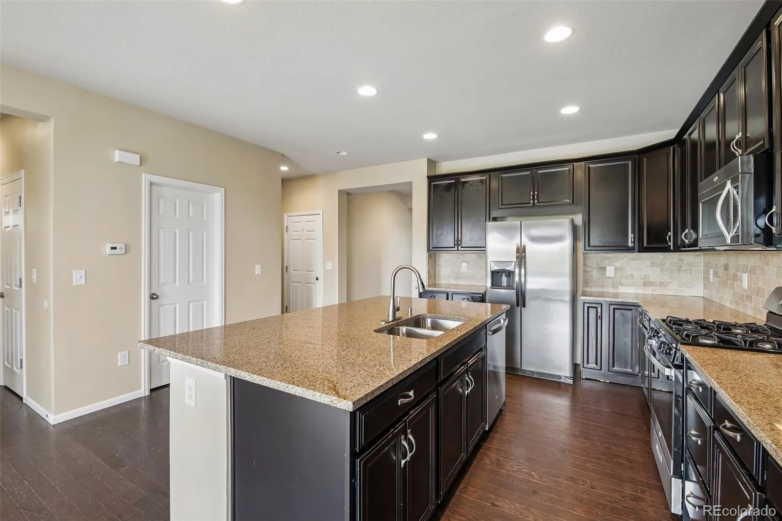 8645 Torrey Street Arvada CO 80007 MLS #REC4529875 05212026235622 1600 13