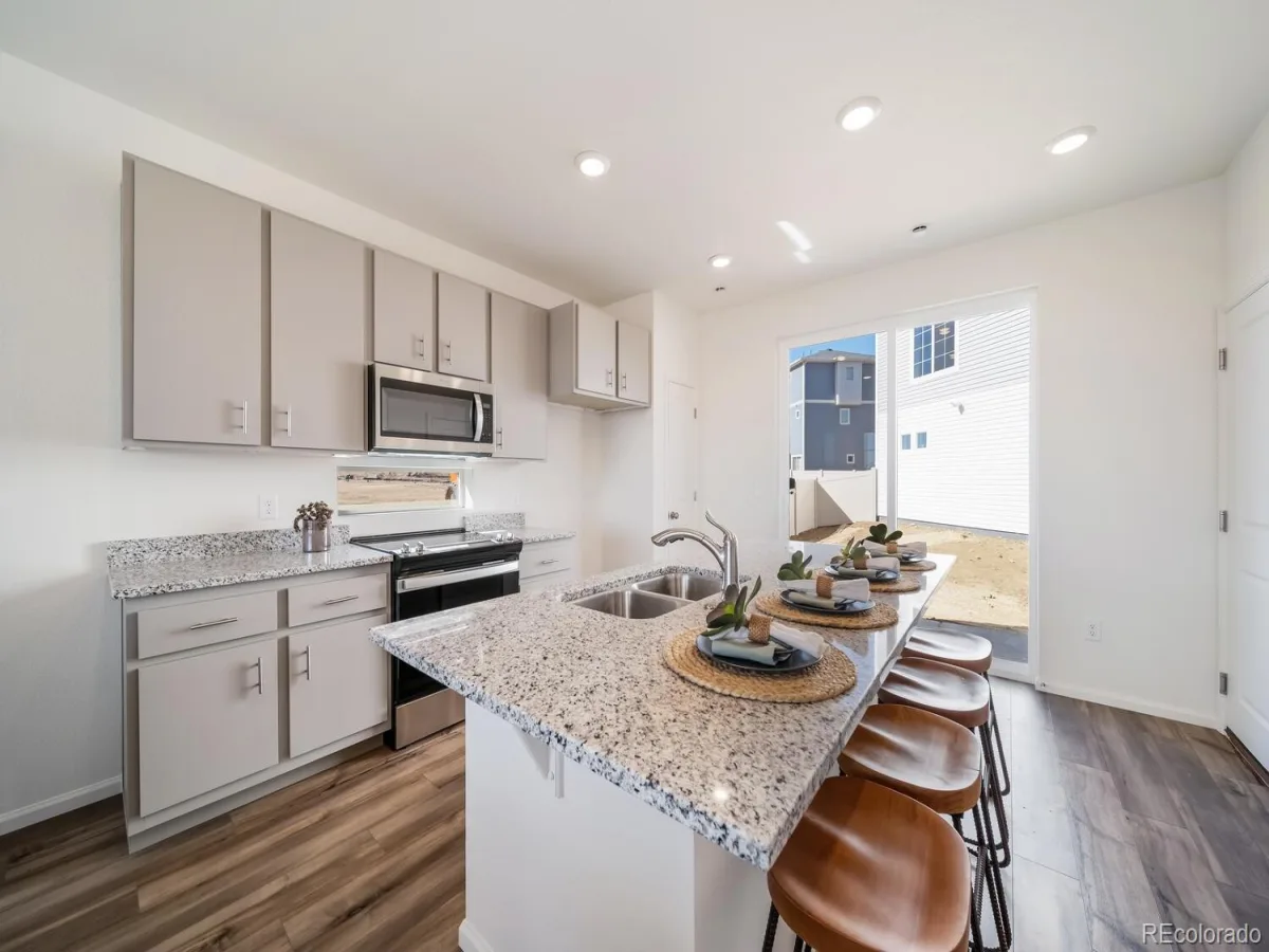12580 E 100th Avenue Commerce City CO 80022 | MLS #REC4572248 06252026012948 1200 2