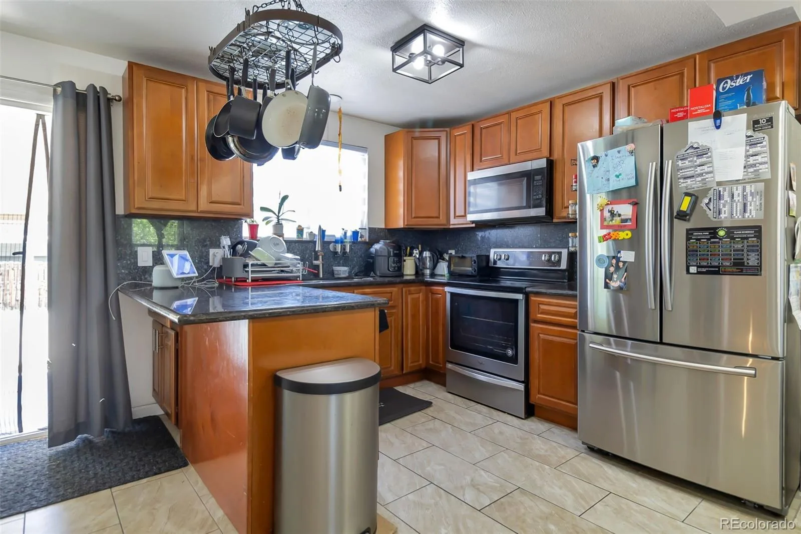 15133 Kelly Place Denver CO 80239 | MLS #REC4605687 07132026005204 1600 10