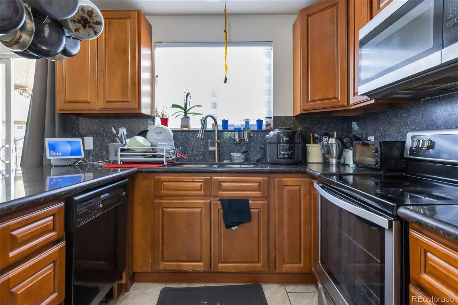15133 Kelly Place Denver CO 80239 | MLS #REC4605687 07132026005204 1600 9