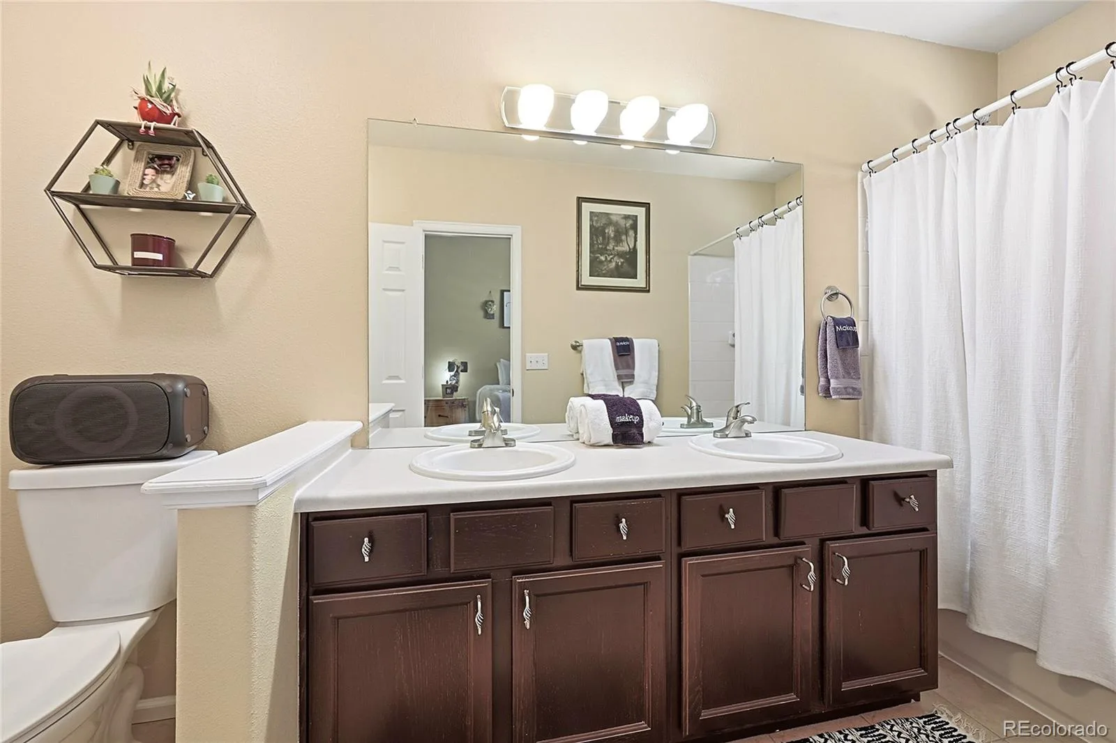 9611 W Chatfield Avenue #A Littleton CO 80128 | MLS #REC4658665 07272026170957 1600 15
