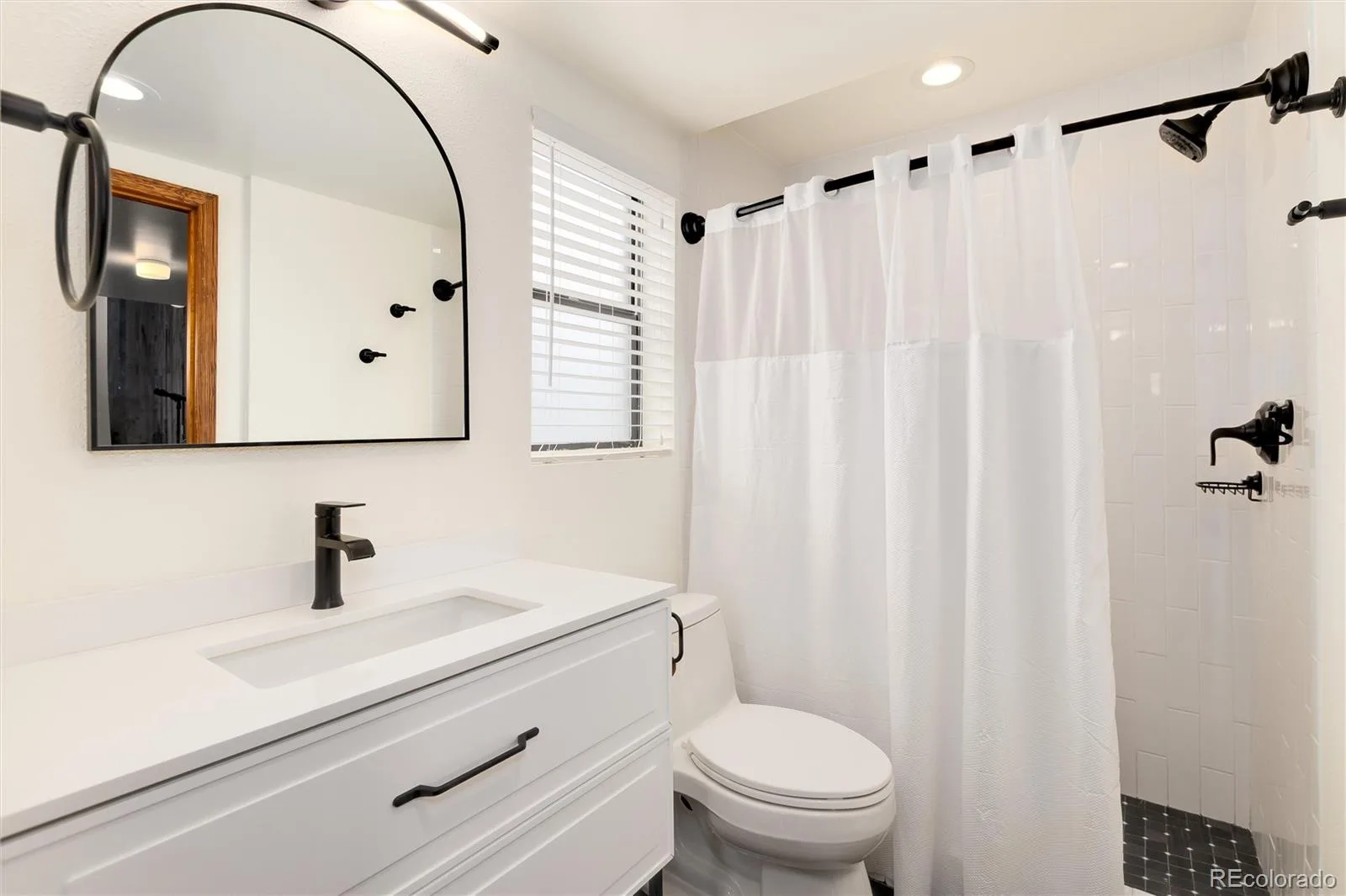 8055 Newman Street Arvada CO 80005 | MLS #REC4672636 08132026175435 1600 20