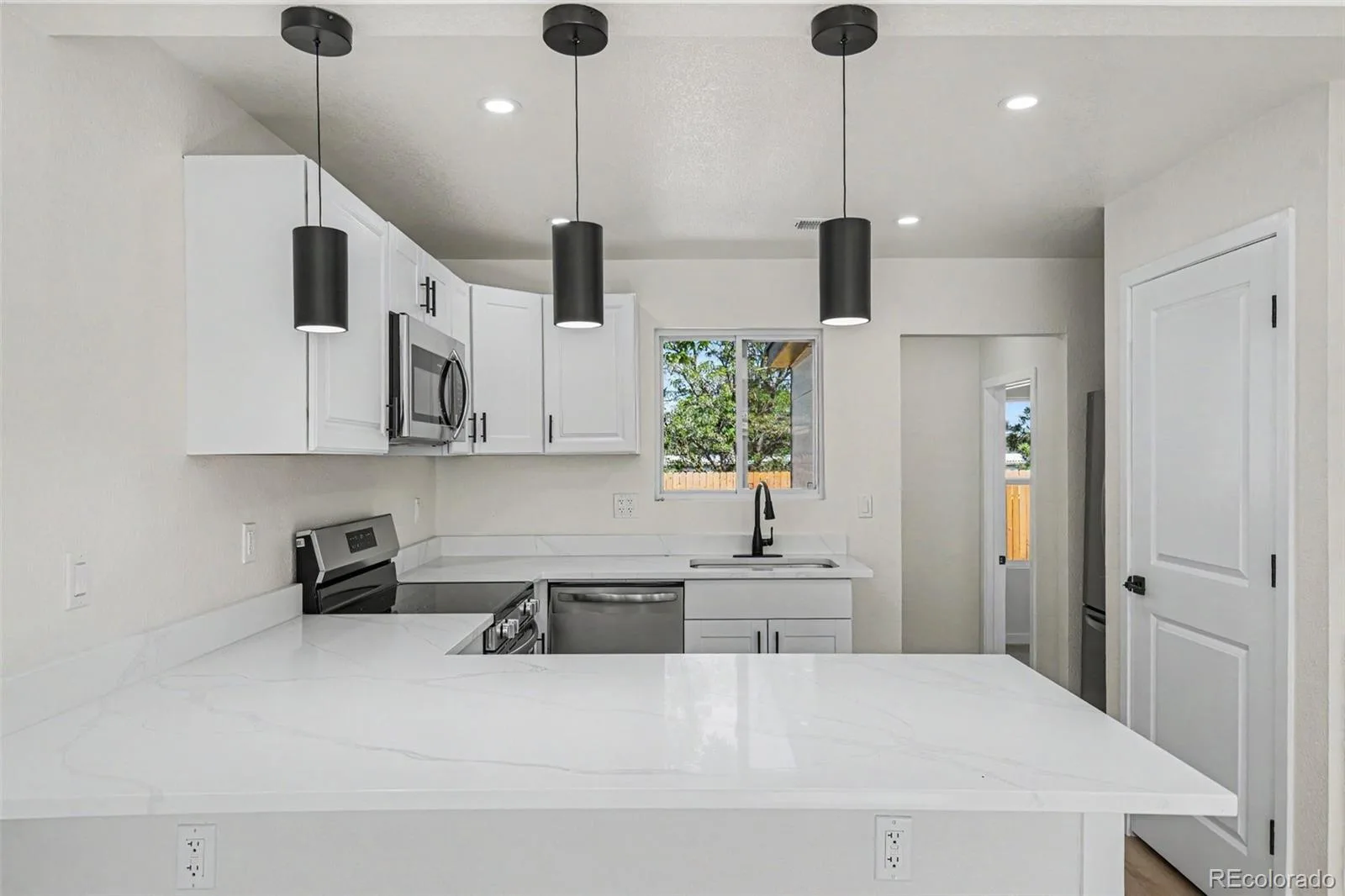7731 Kearney Drive Commerce City CO 80022 | MLS #REC4673024 08202026000556 1600 9