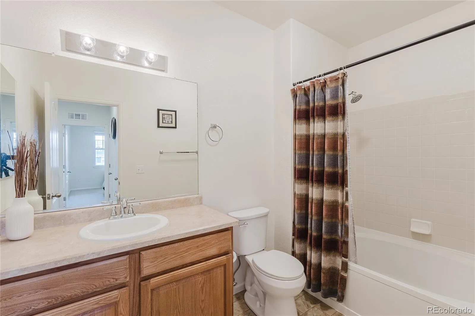 7130 Simms Street #202 Arvada CO 80004 | MLS #REC4677420 08012026050443 1600 20