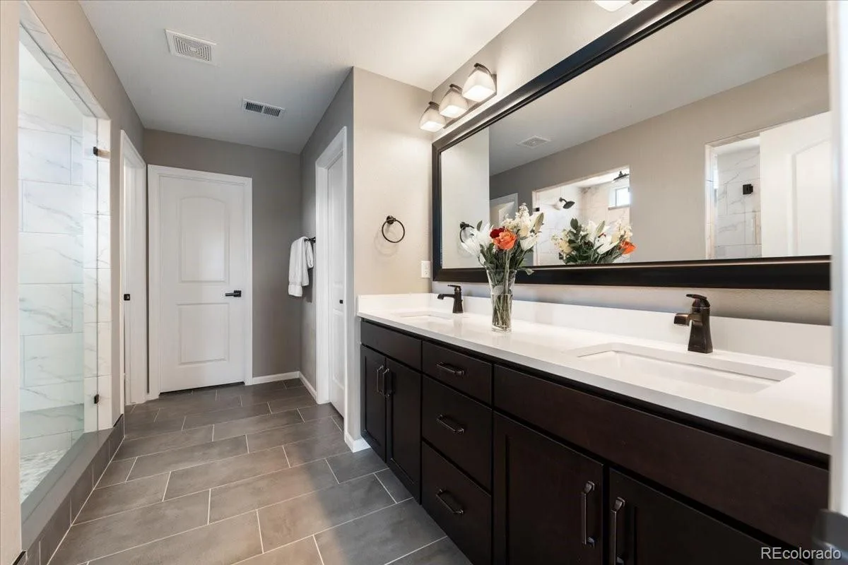 8480 Arapahoe Peak Street Littleton CO 80125 | MLS #REC4763732 08072026154204 1200 25