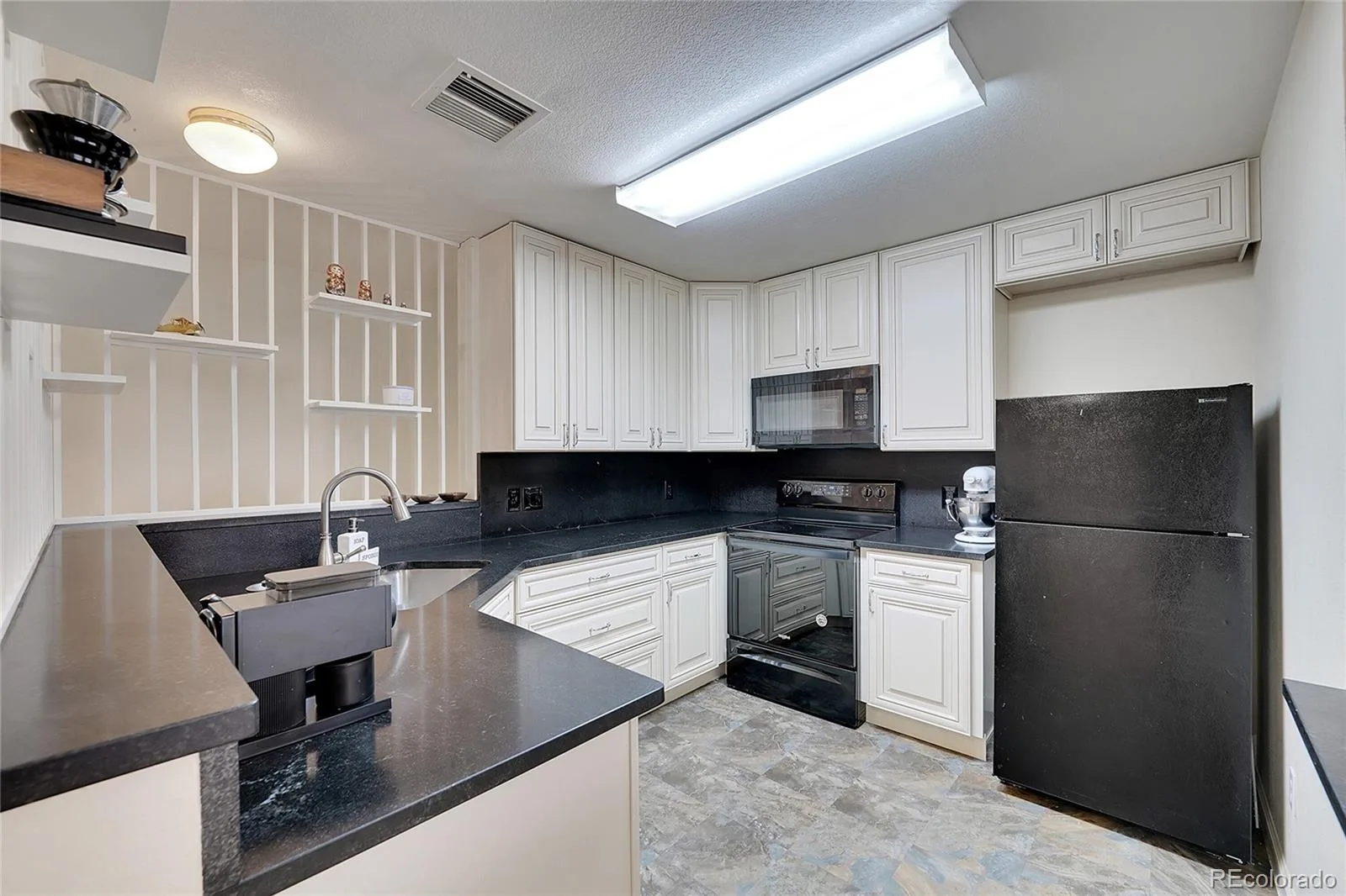 1308 S Danube Way #102 Aurora CO 80017 | MLS #REC4768749 07252026024851 1600 13