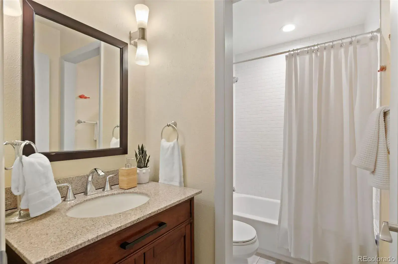 6530 E Colorado Drive Denver CO 80224 MLS #REC4848899 03052026003616 1600 24