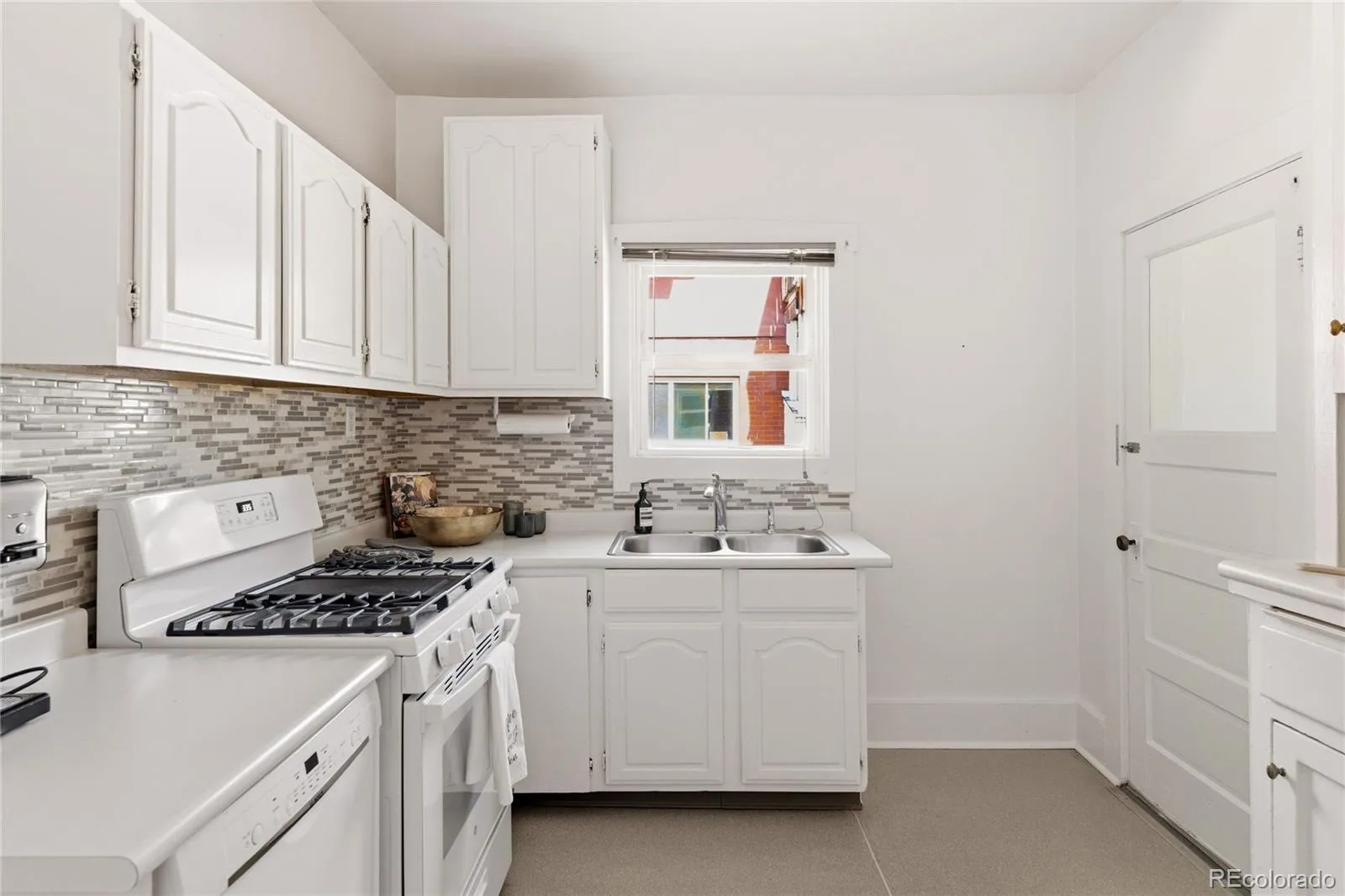 4734 W 33rd Avenue Denver CO 80212 | MLS #REC4972764 08212026215006 1600 14
