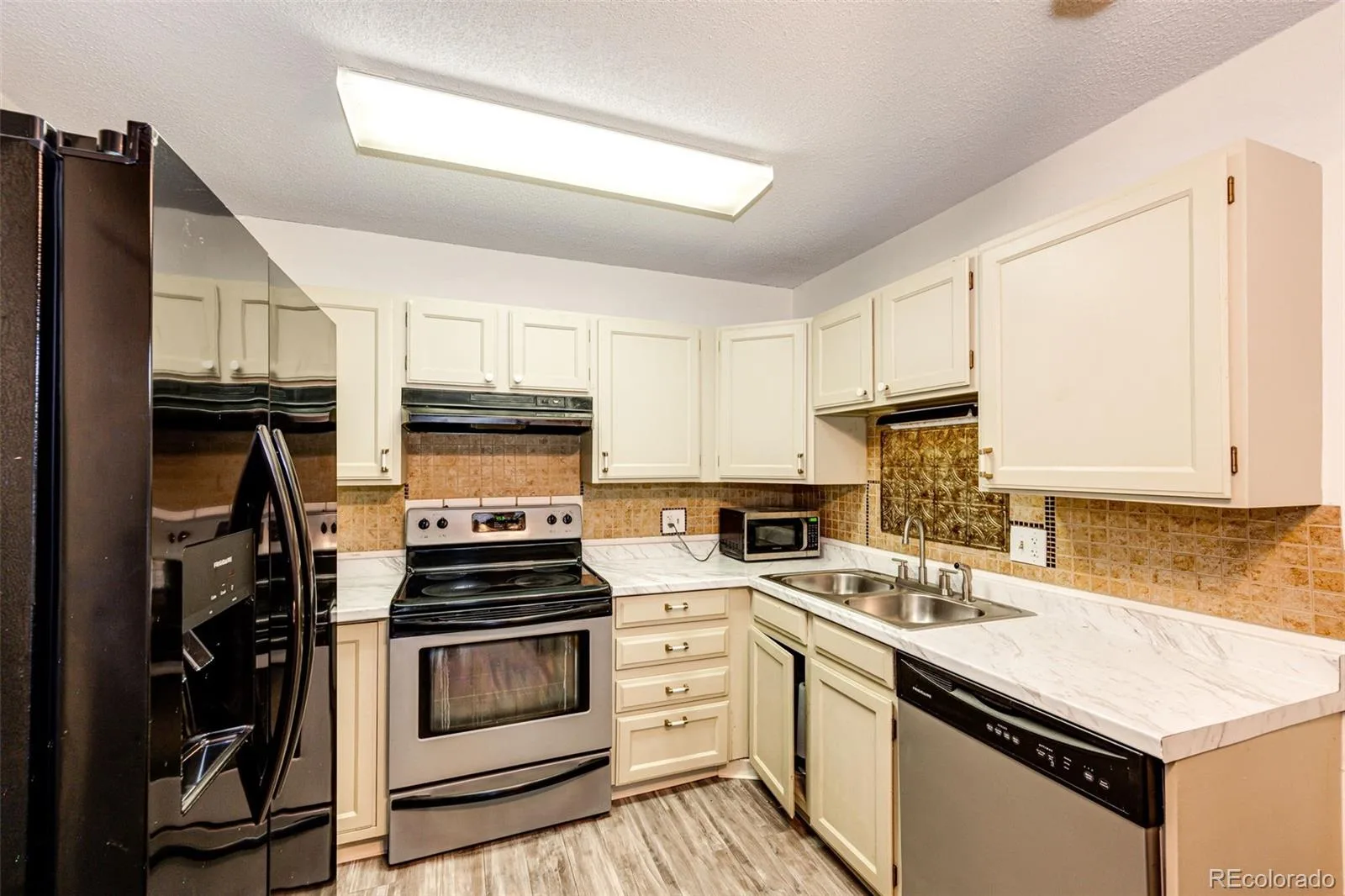 3082 S Wheeling Way #105 Aurora CO 80014 MLS #REC4979016 05292026222835 1600 12