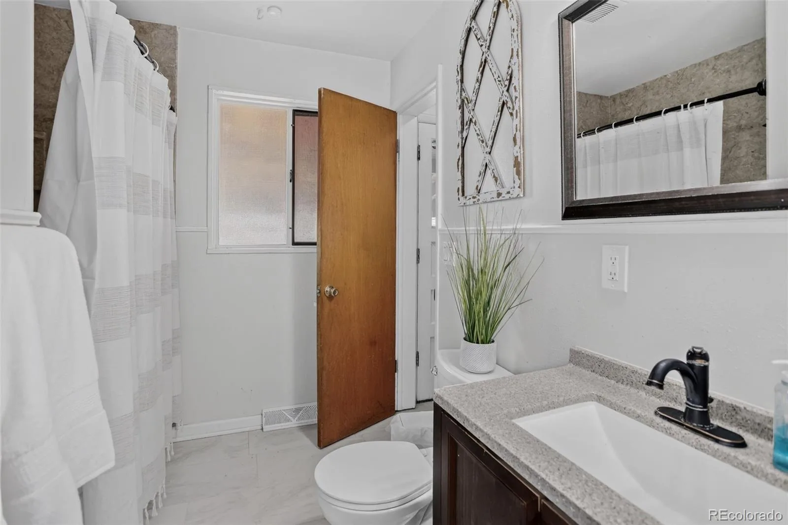 2940 W Saratoga Avenue Englewood CO 80110 | MLS #REC4996252 08192026225236 1600 17