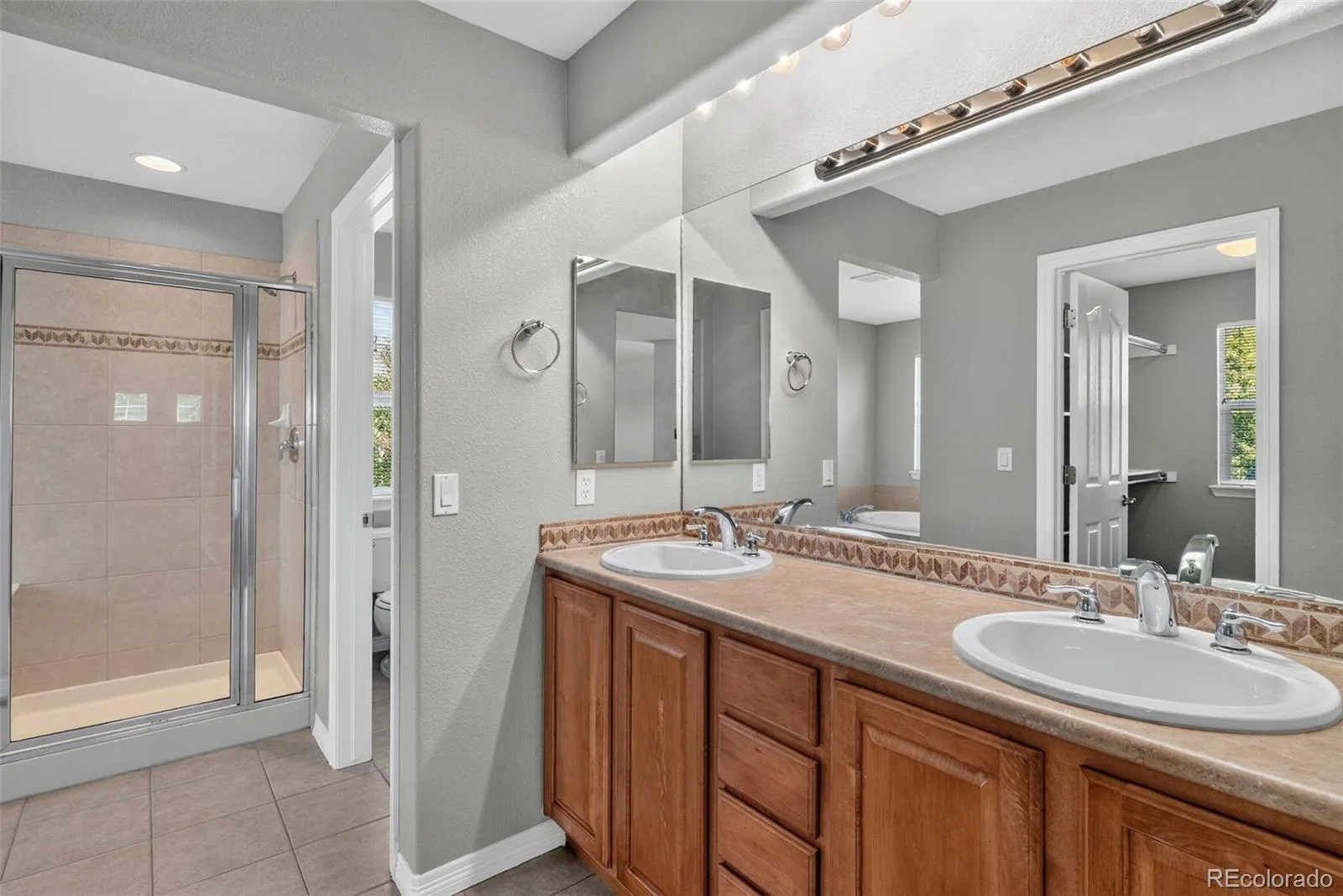 17463 E 98th Way Commerce City CO 80022 | MLS #REC5007359 08062026140839 1600 22