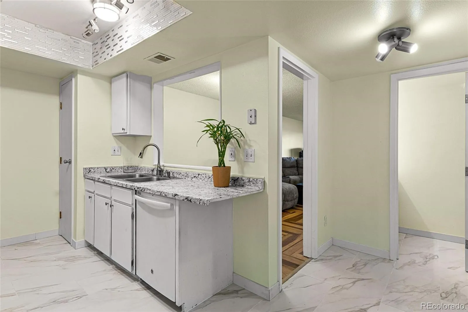 3550 S Harlan Street #119 Denver CO 80235 MLS #REC5069799 05222026220957 1600 6
