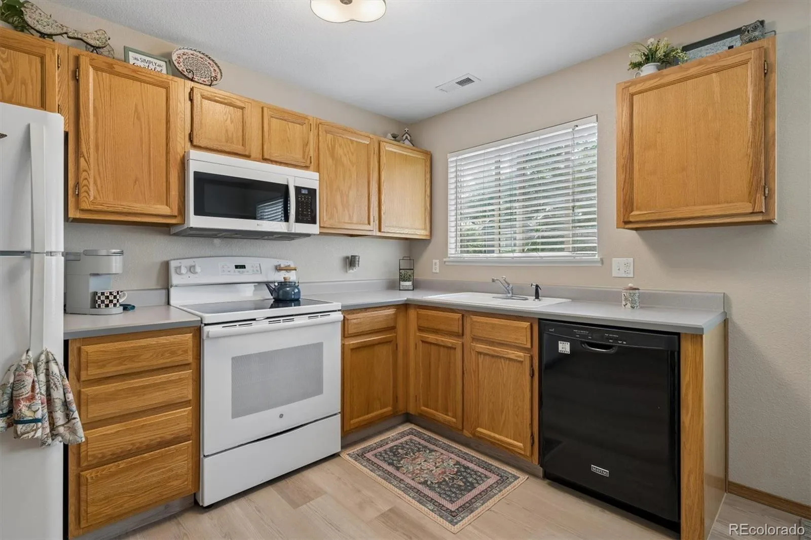 8477 S Reed Street #2-202 Littleton CO 80128 | MLS #REC5088271 07092026163941 1600 13