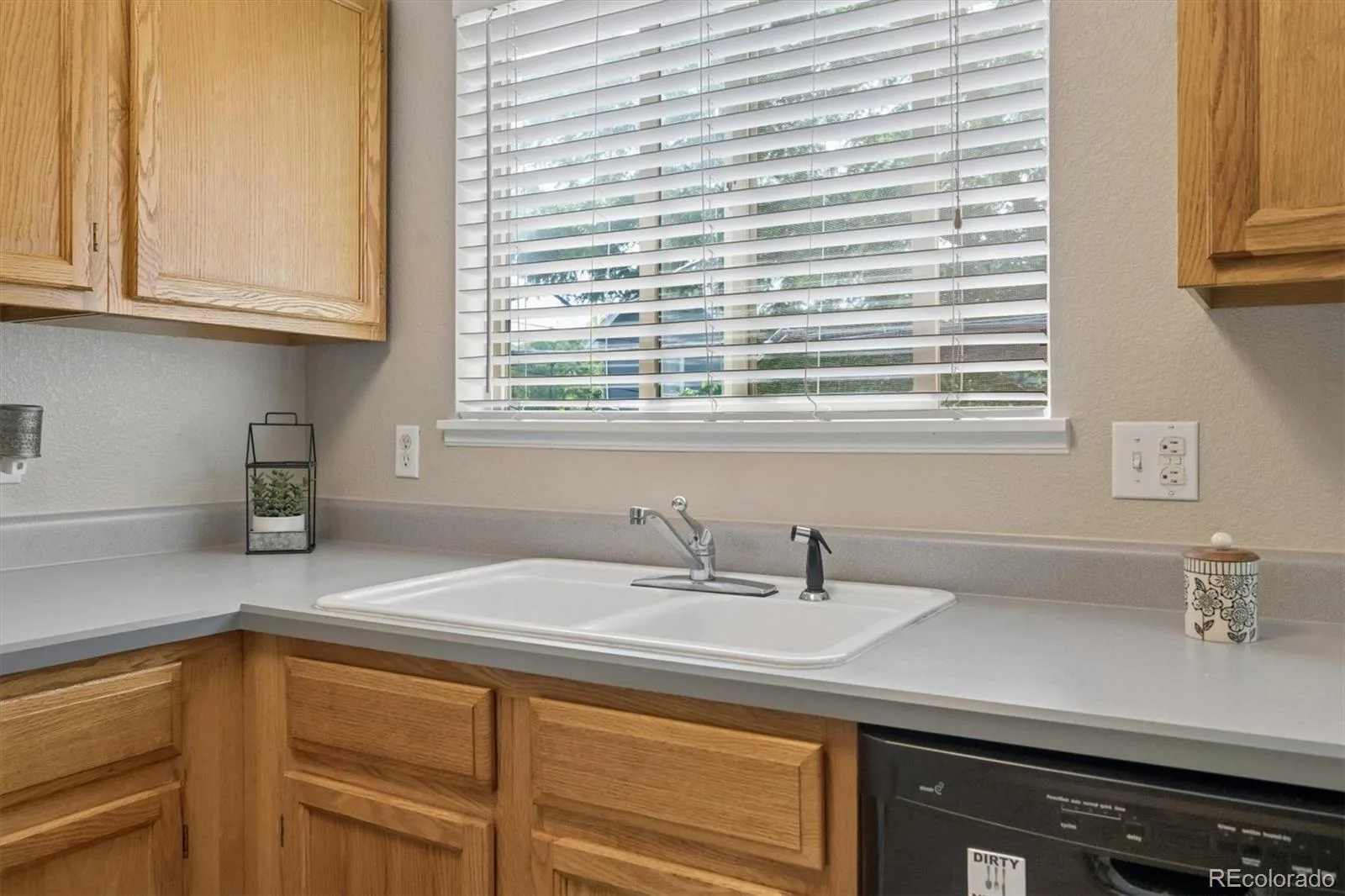 8477 S Reed Street #2-202 Littleton CO 80128 | MLS #REC5088271 07092026163941 1600 14