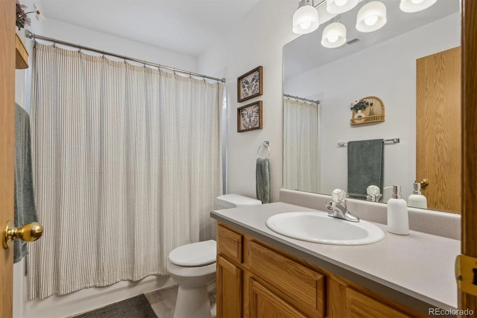 8477 S Reed Street #2-202 Littleton CO 80128 | MLS #REC5088271 07092026163941 1600 21
