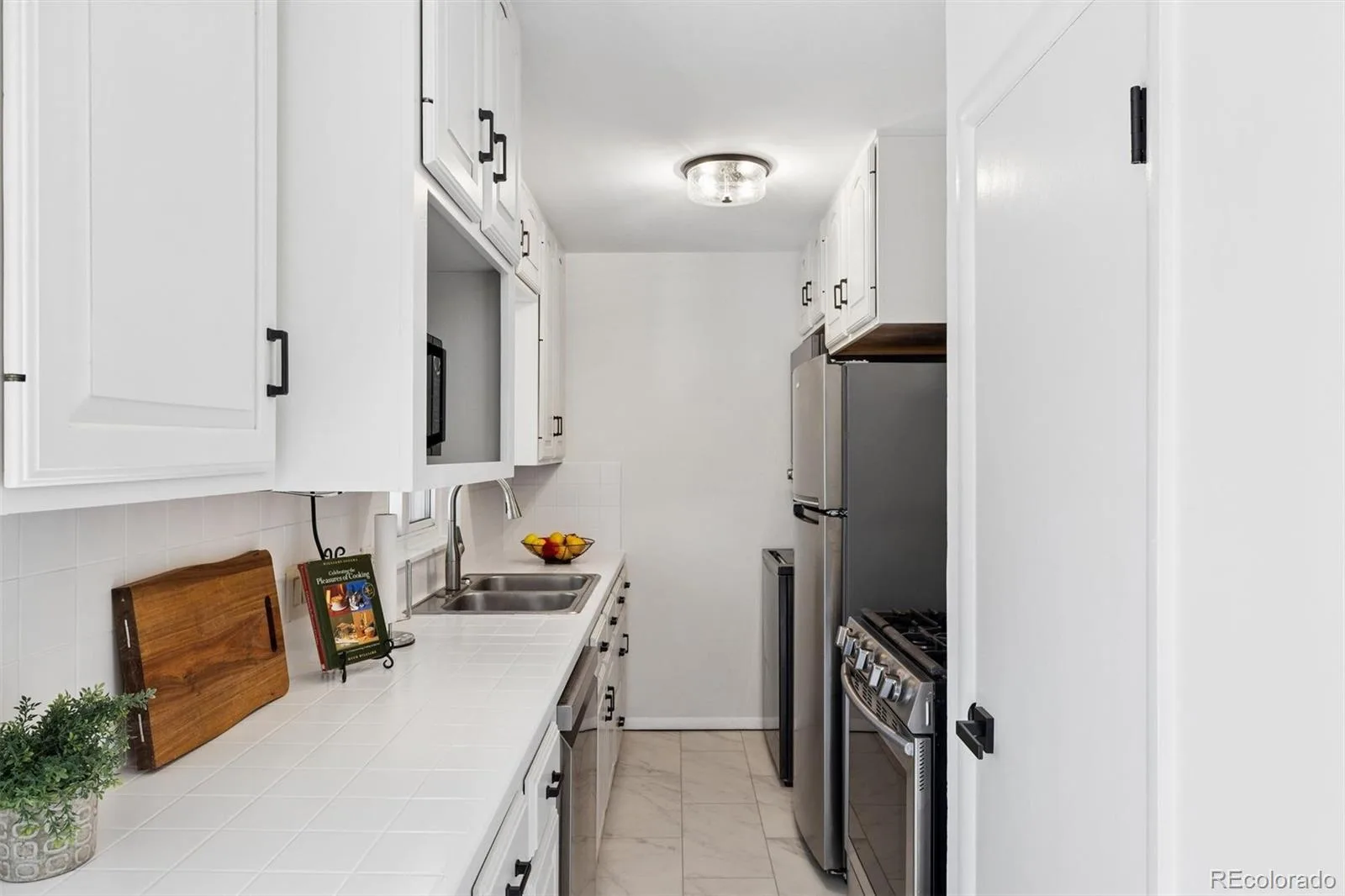 5040 E Dartmouth Avenue Denver CO 80222 | MLS #REC5144877 08202026183913 1600 10