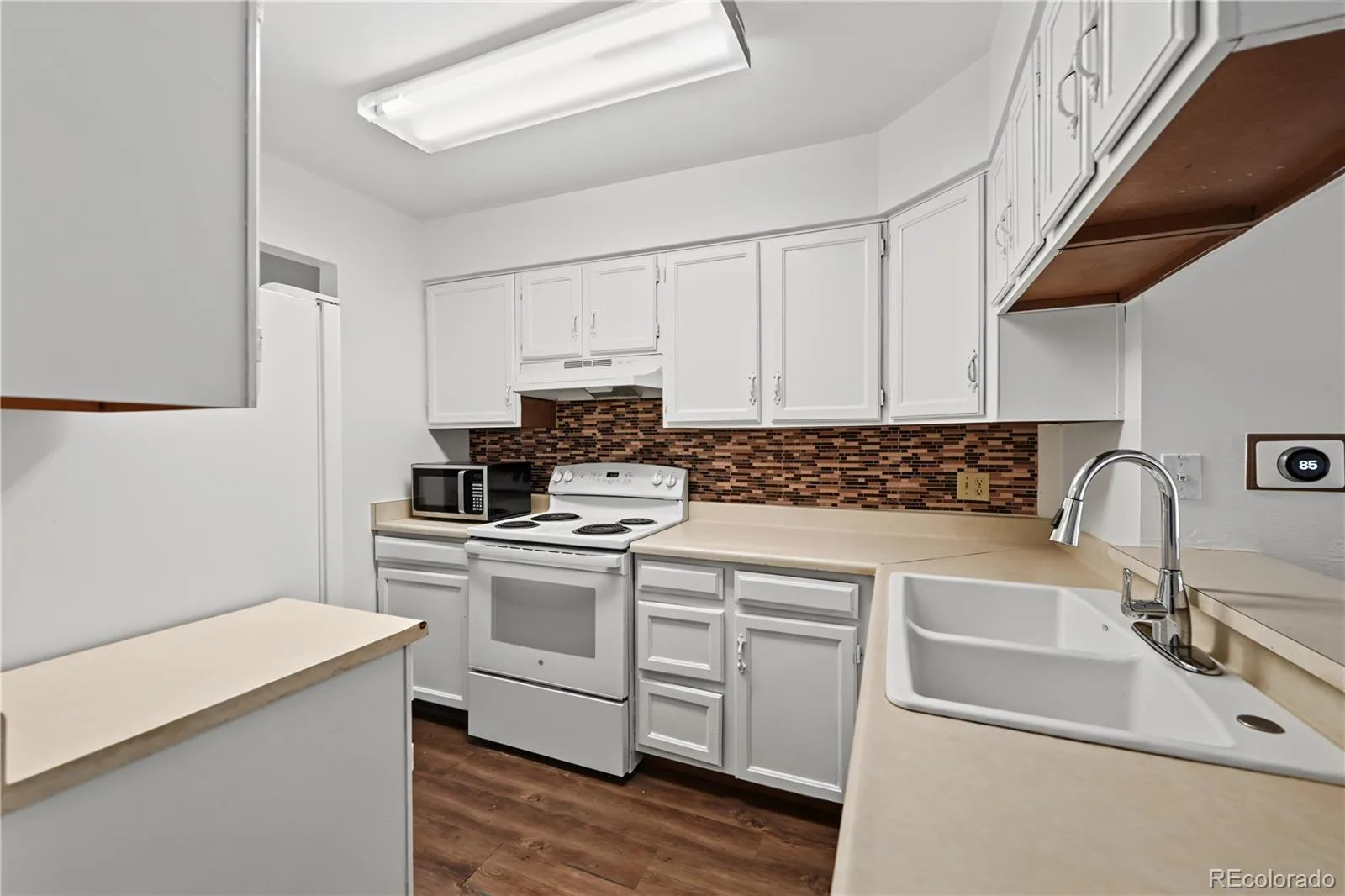 15566 E Louisiana Avenue Aurora CO 80017 | MLS #REC5153906 07302026140824 1600 8