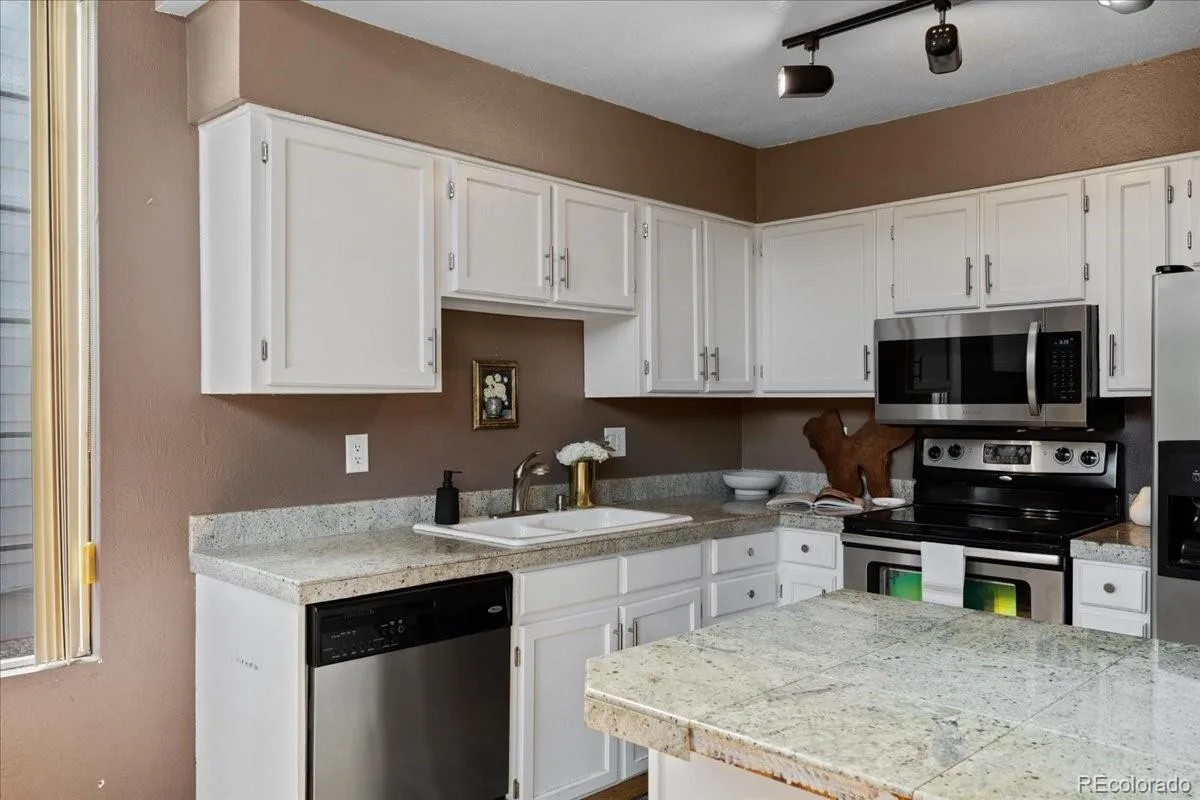 12543 E Cornell Circle Aurora CO 80014 | MLS #REC5197582 08132026212612 1200 20