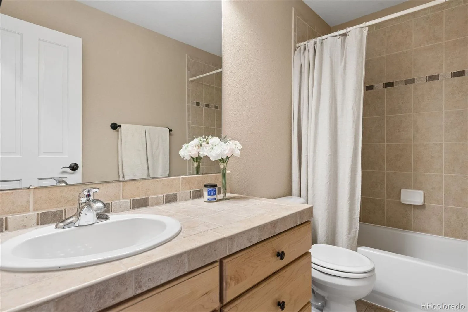 7141 S Elk Court Aurora CO 80016 MLS #REC5203019 07092026230526 1600 35
