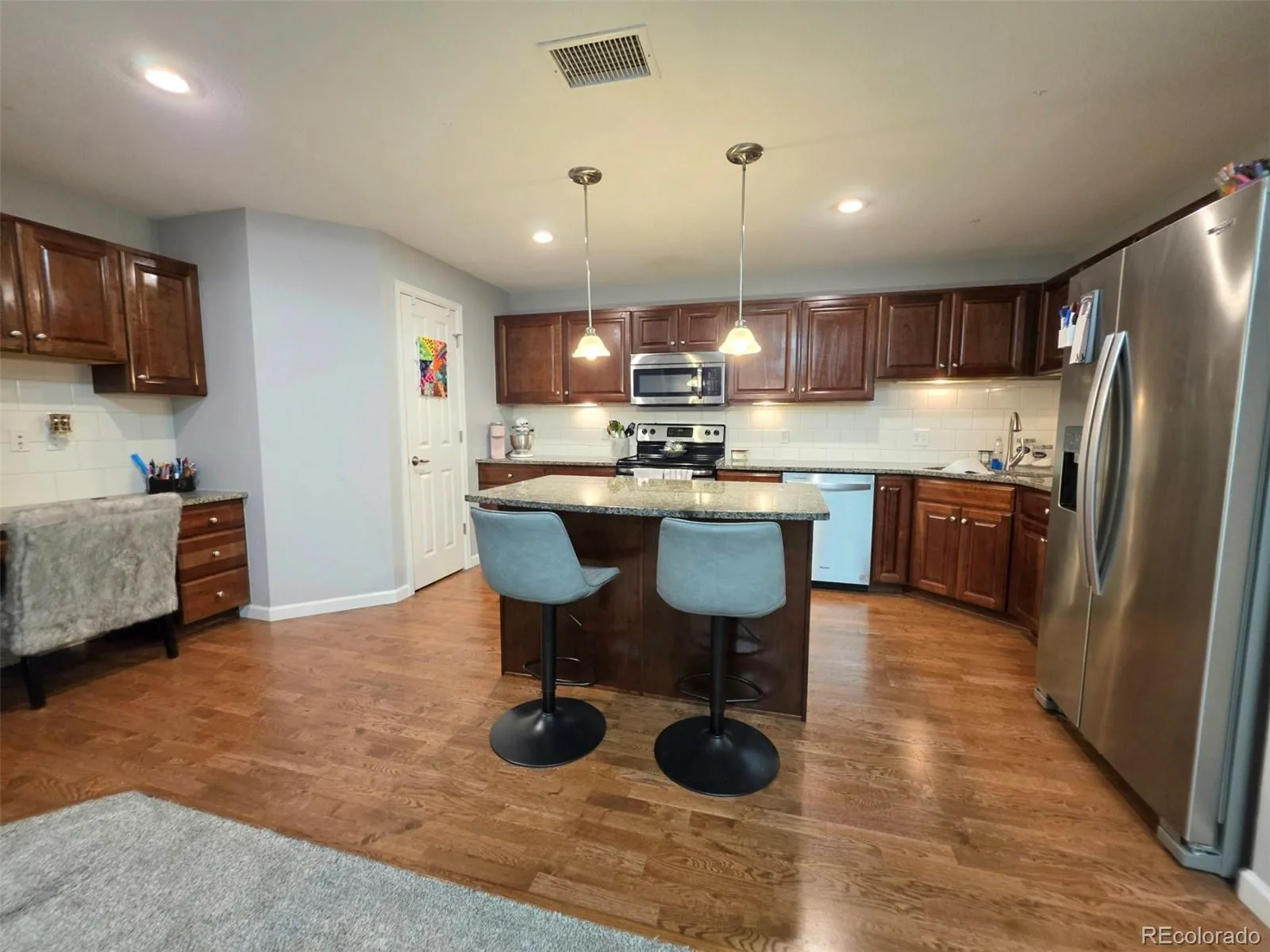 9305 Las Ramblas Court #E Parker CO 80134 | MLS #REC5356901 08022026050453 1600 3