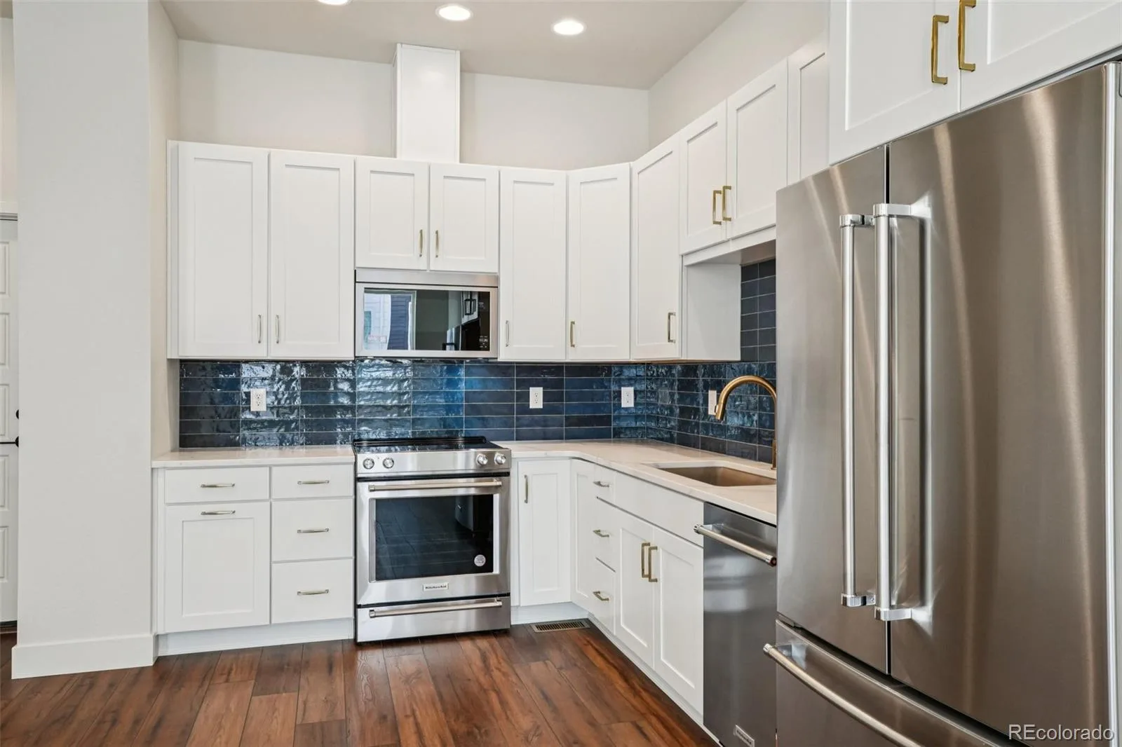 3126 W Bonfils Place Denver CO 80236 | MLS #REC5384953 06102026190233 1600 1