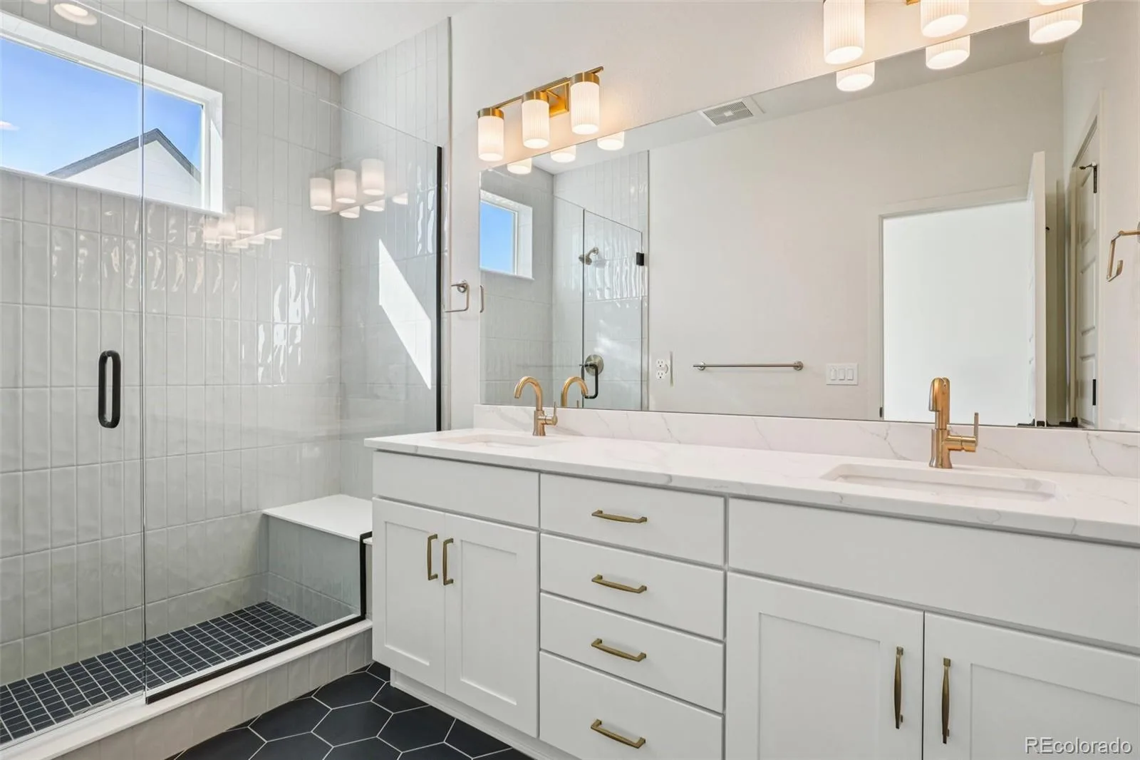 3126 W Bonfils Place Denver CO 80236 | MLS #REC5384953 06102026190233 1600 16