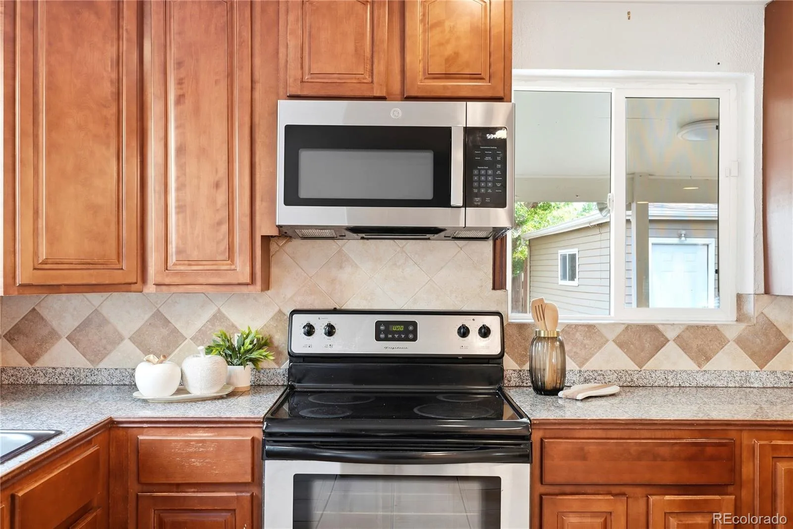 5520 E Thrill Place Denver CO 80207 MLS #REC5400806 07092026163958 1600 16