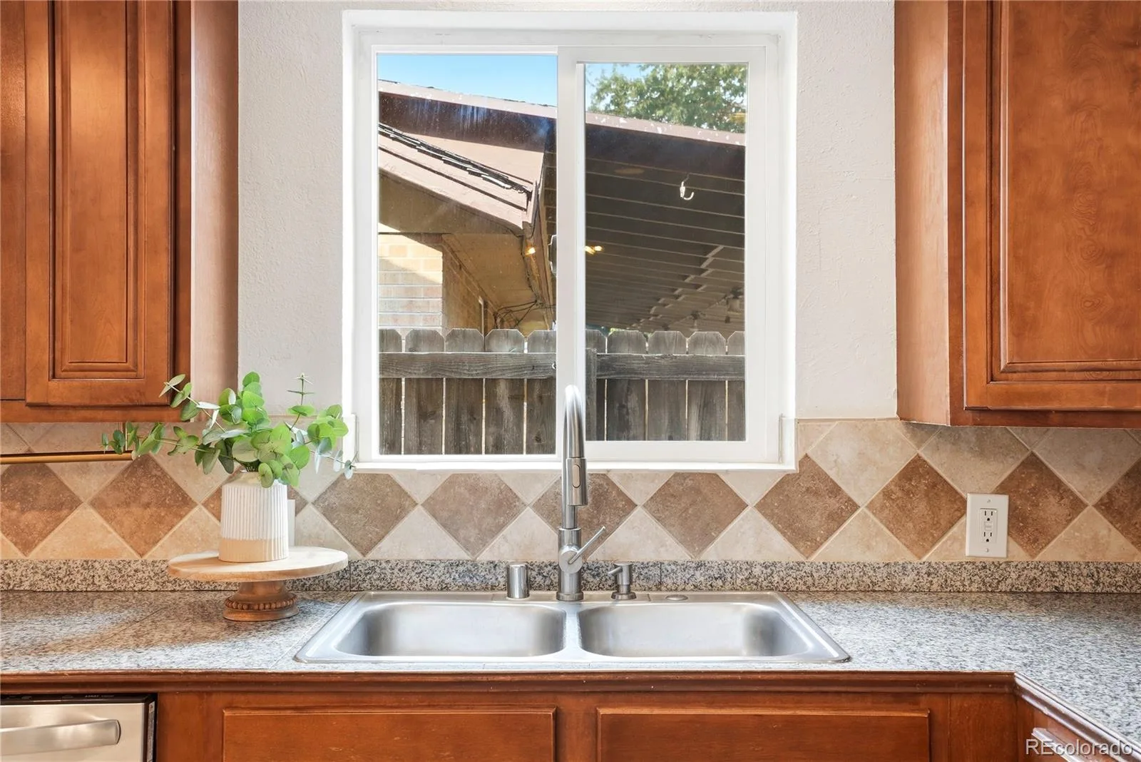 5520 E Thrill Place Denver CO 80207 MLS #REC5400806 07092026163958 1600 17