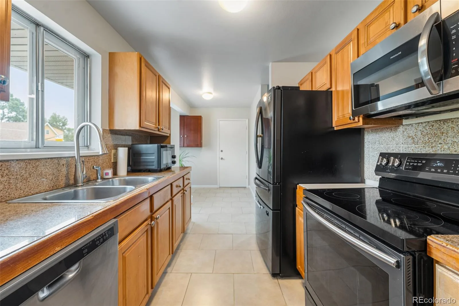 14990 E 10th Avenue Aurora CO 80011 | MLS #REC5401174 08142026155556 1600 4