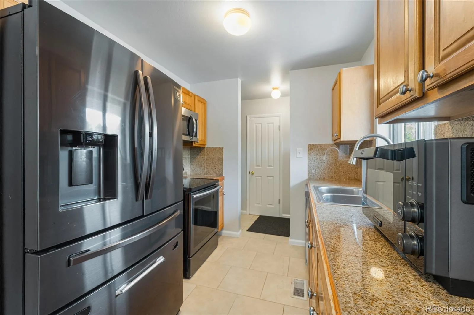 14990 E 10th Avenue Aurora CO 80011 | MLS #REC5401174 08142026155556 1600 5