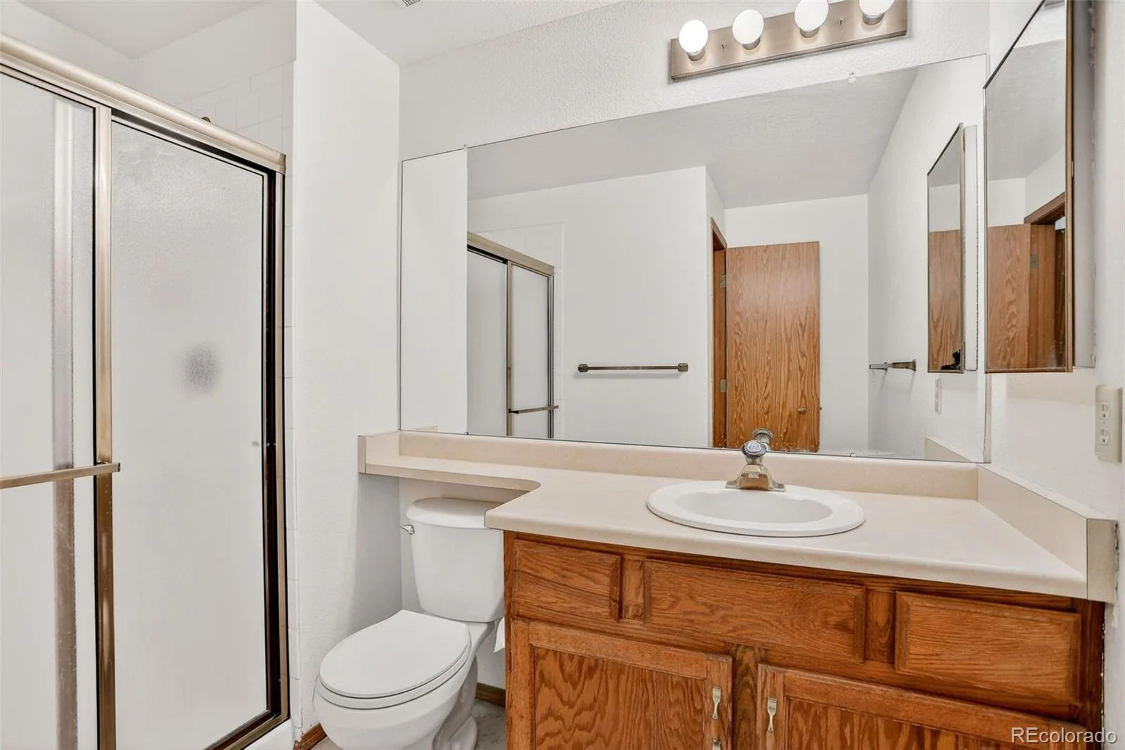 9157 W Cedar Drive #1 Lakewood CO 80226 | MLS #REC5401280 08142026185025 1600 25