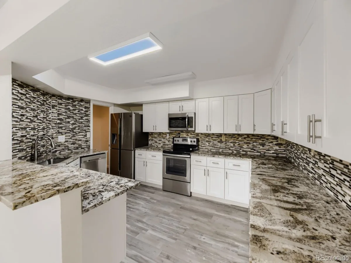 7370 S Yampa Street Aurora CO 80016 | MLS #REC5413489 07202026211449 1200 12