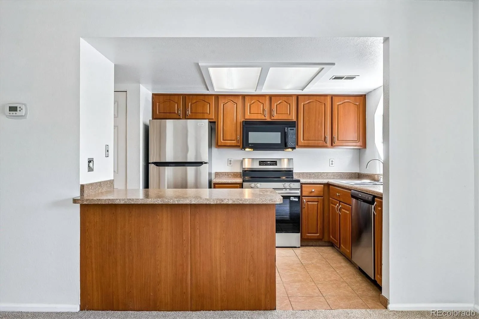 12583 E Pacific Circle #D Aurora CO 80014 MLS #REC5418440 05212026184359 1600 4
