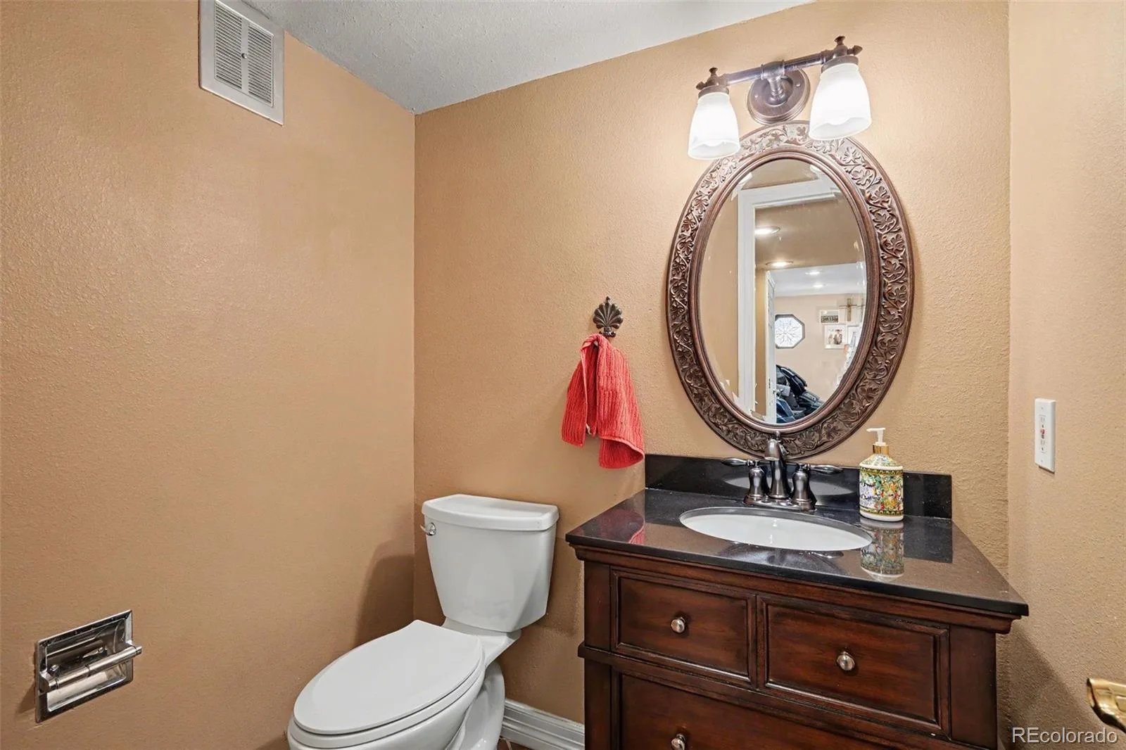8143 S Otis Court Littleton CO 80128 | MLS #REC5515930 07022026234218 1600 14